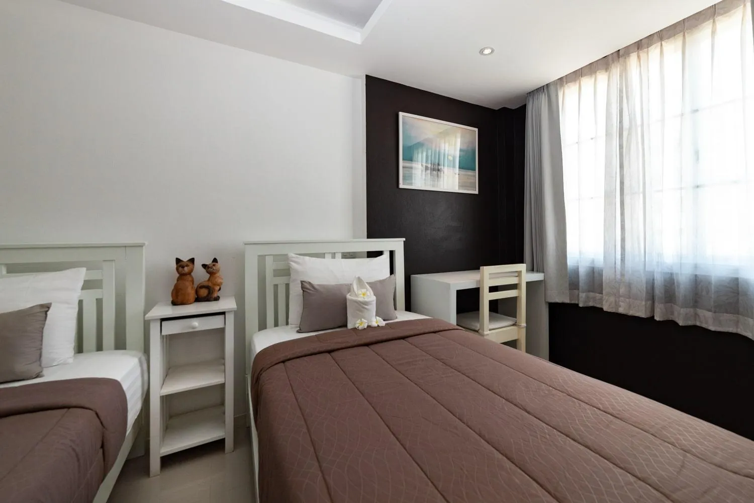 Bed in Baanpoon Apartment