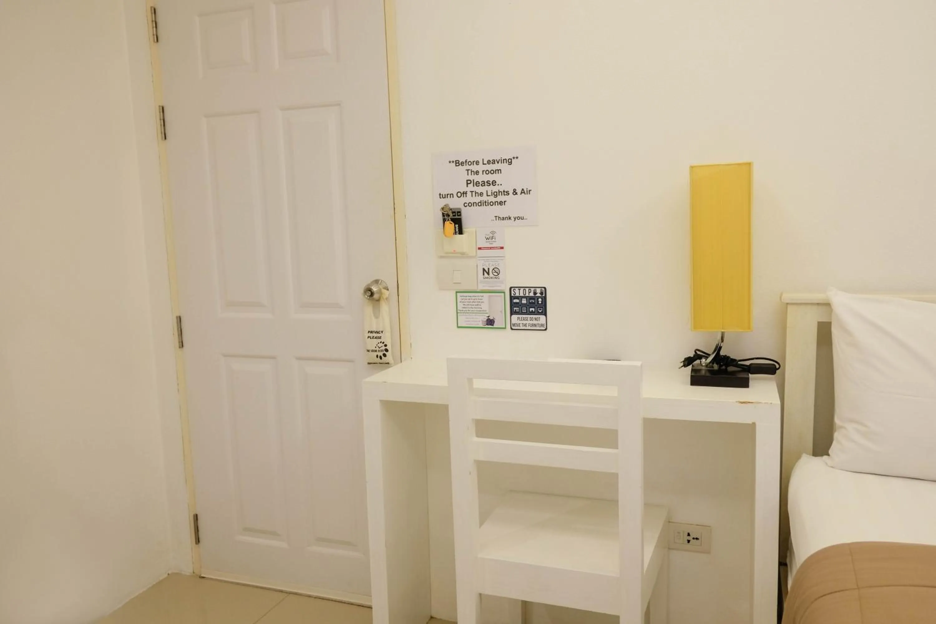 Seating area, Bed in Baanpoon Apartment