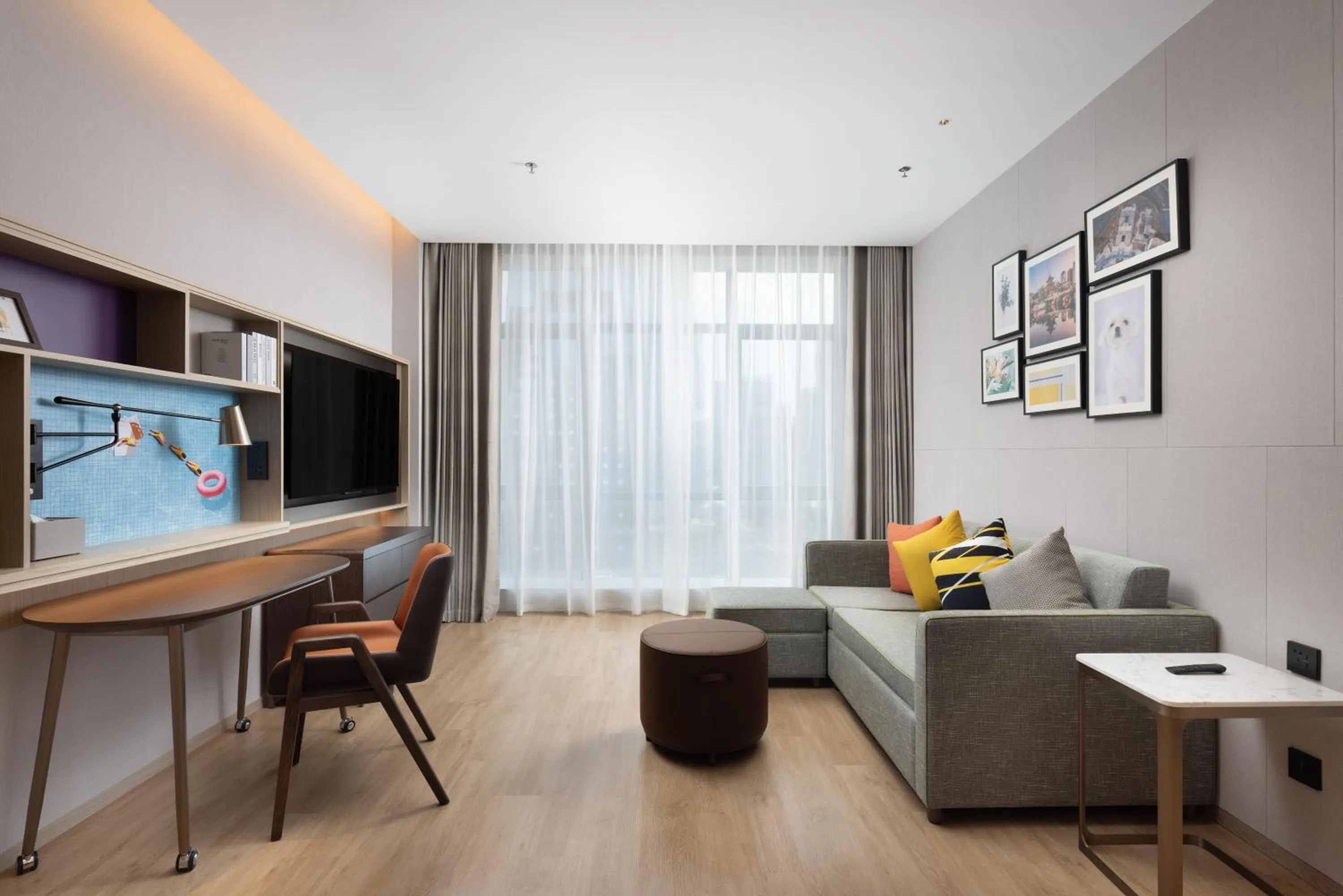 Communal lounge/ TV room in Home2 Suites by Hilton Guiyang Guanshanhu