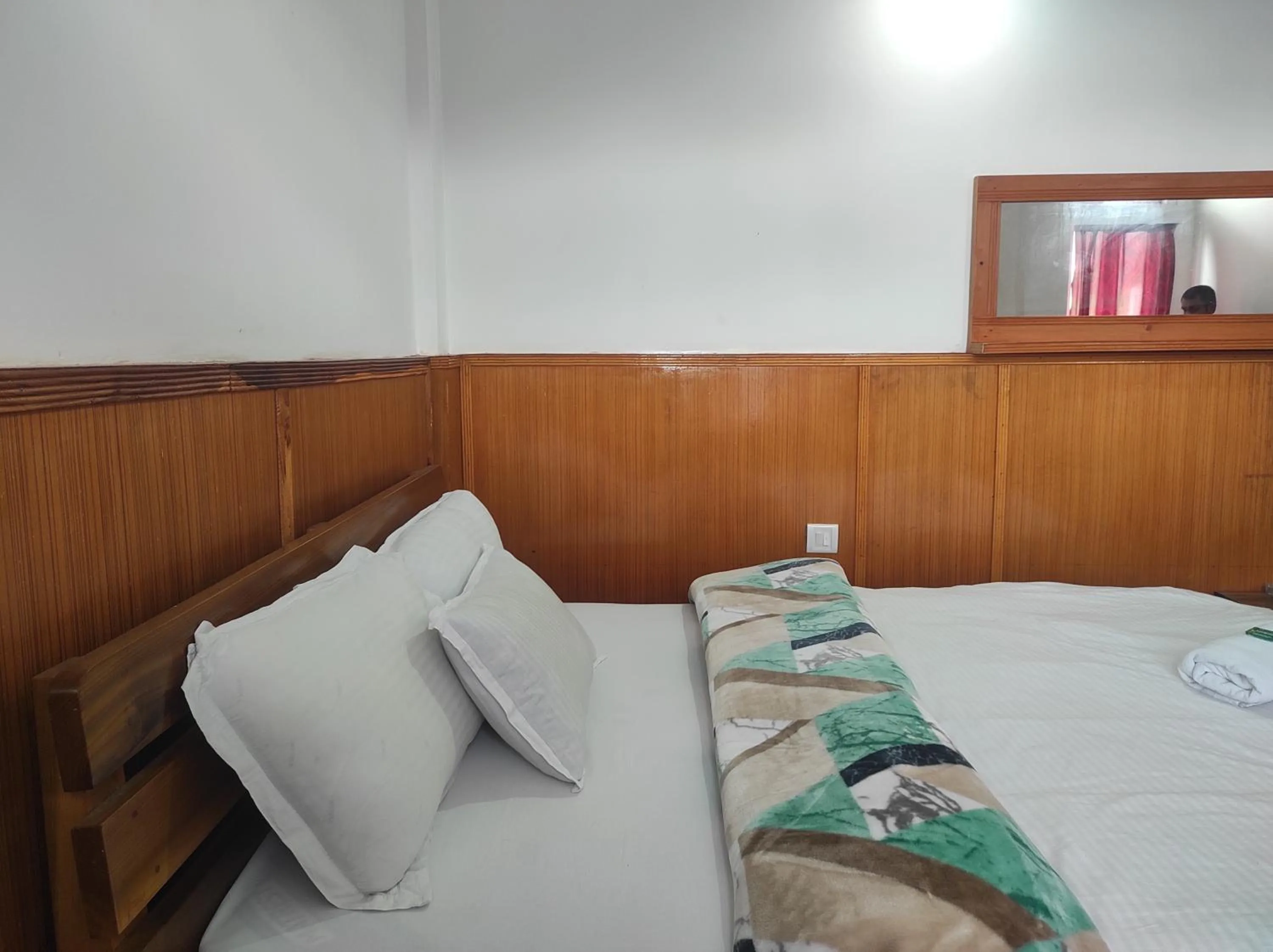 Bedroom in Hotel Tawang Regency