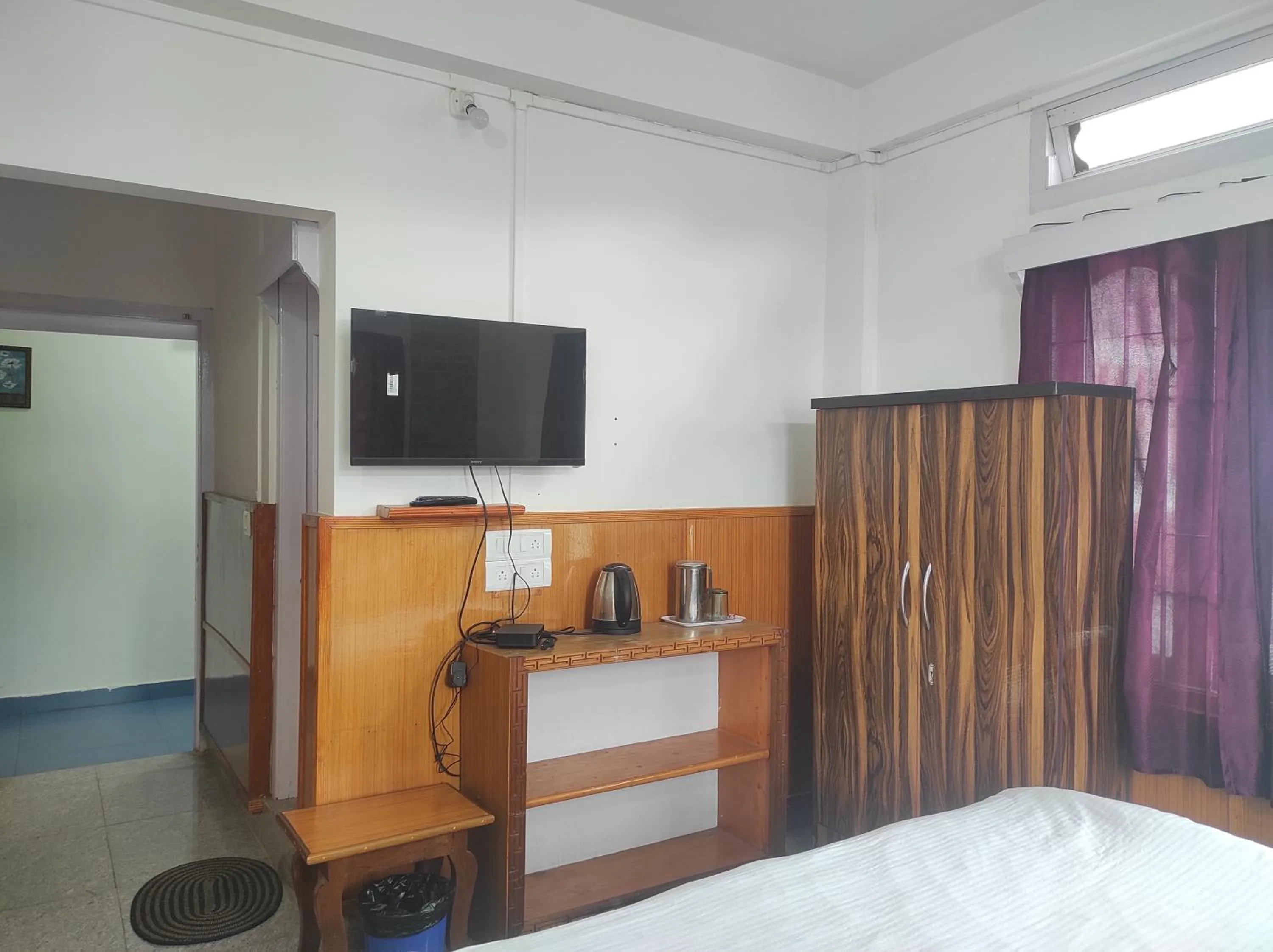 Bed in Hotel Tawang Regency