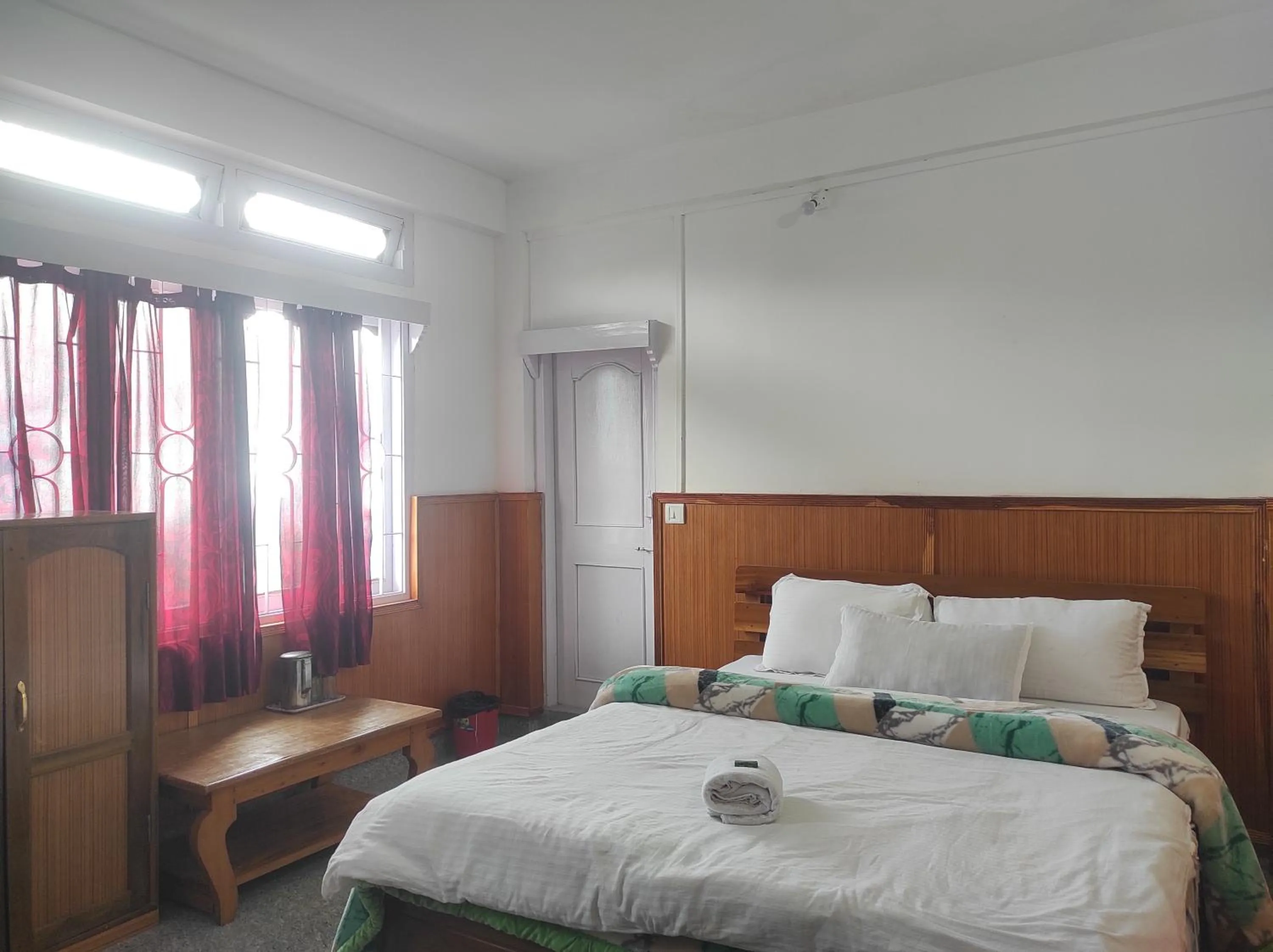 Bed in Hotel Tawang Regency