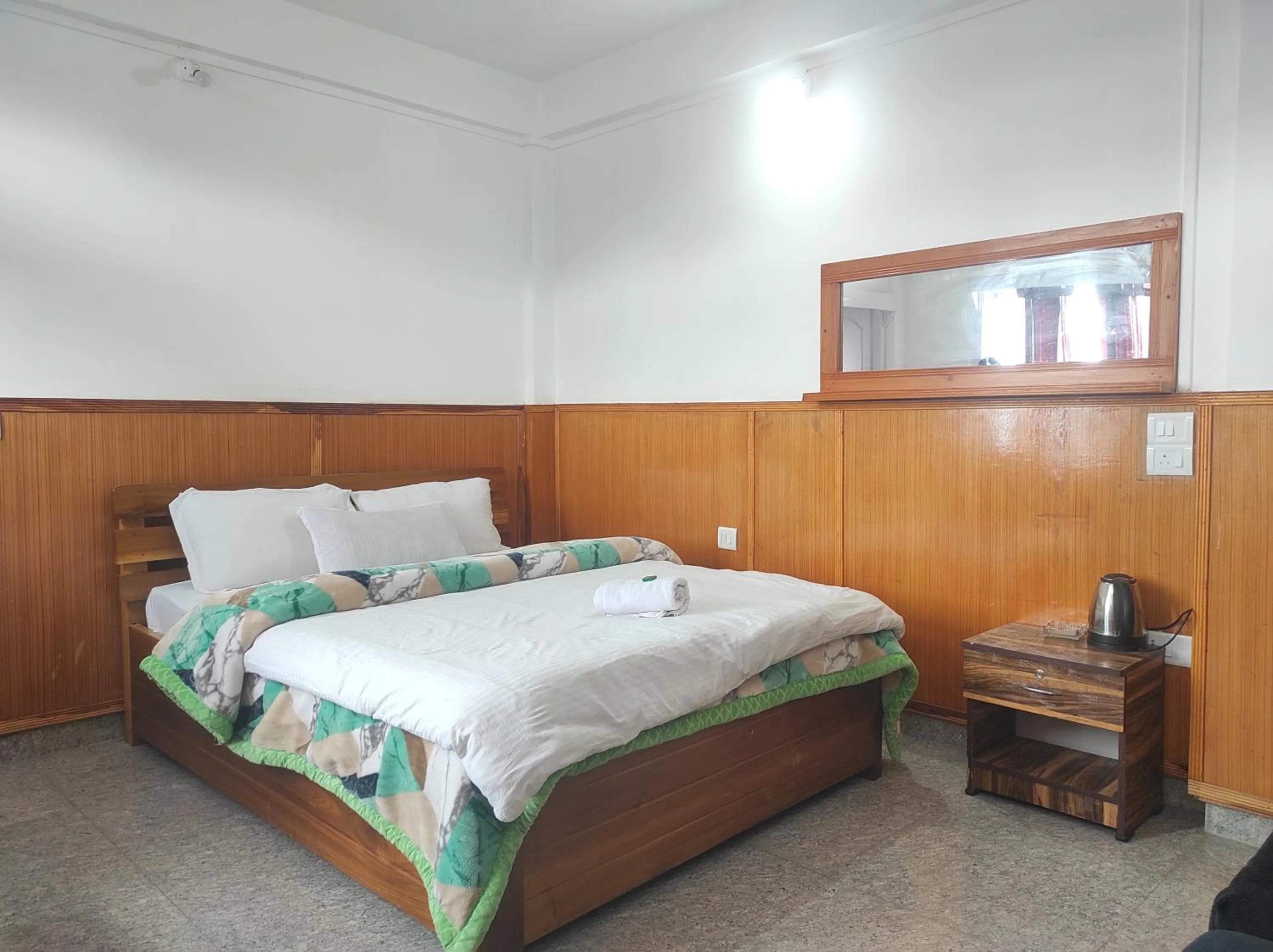 Bedroom in Hotel Tawang Regency