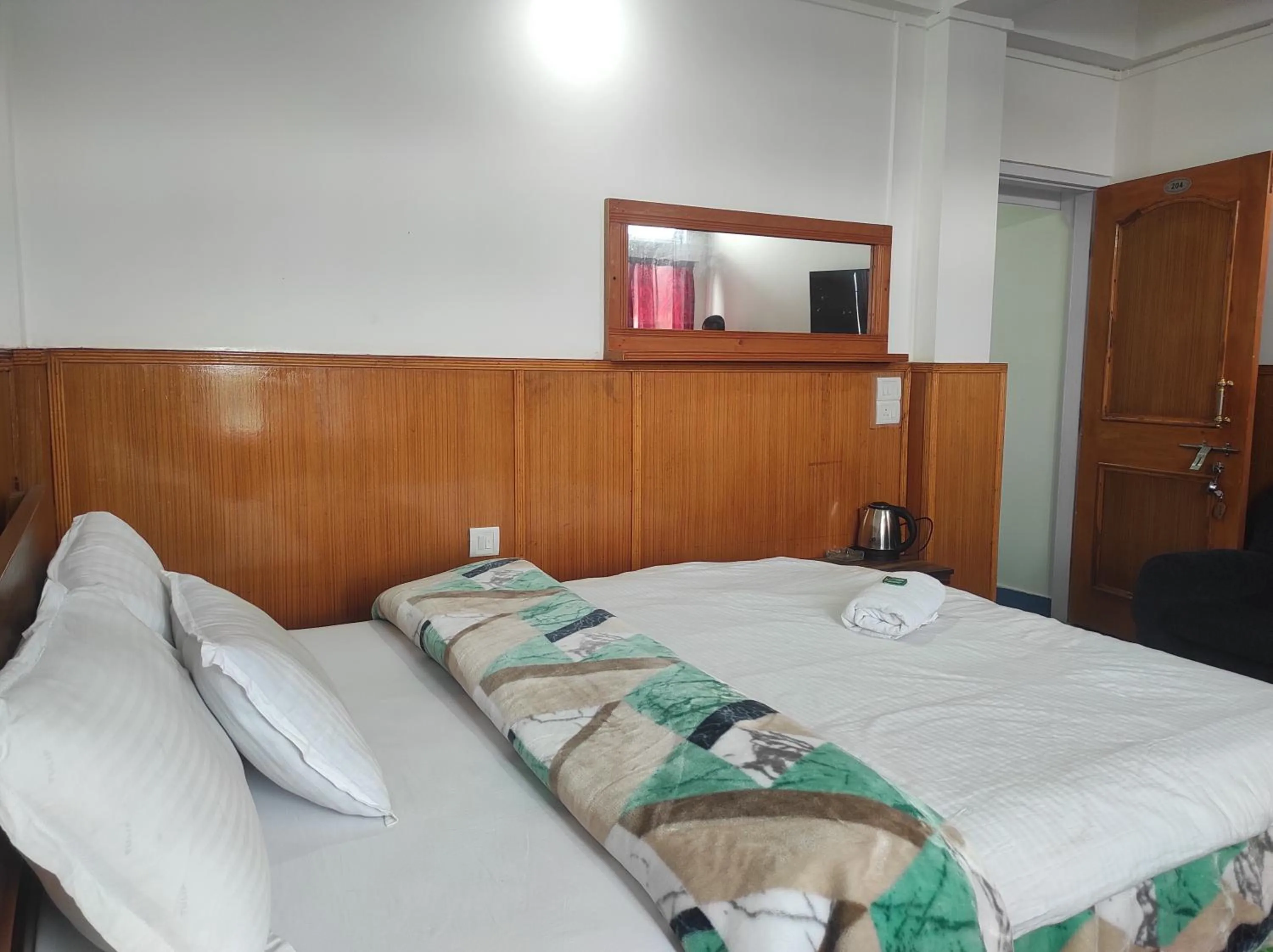 Bedroom in Hotel Tawang Regency