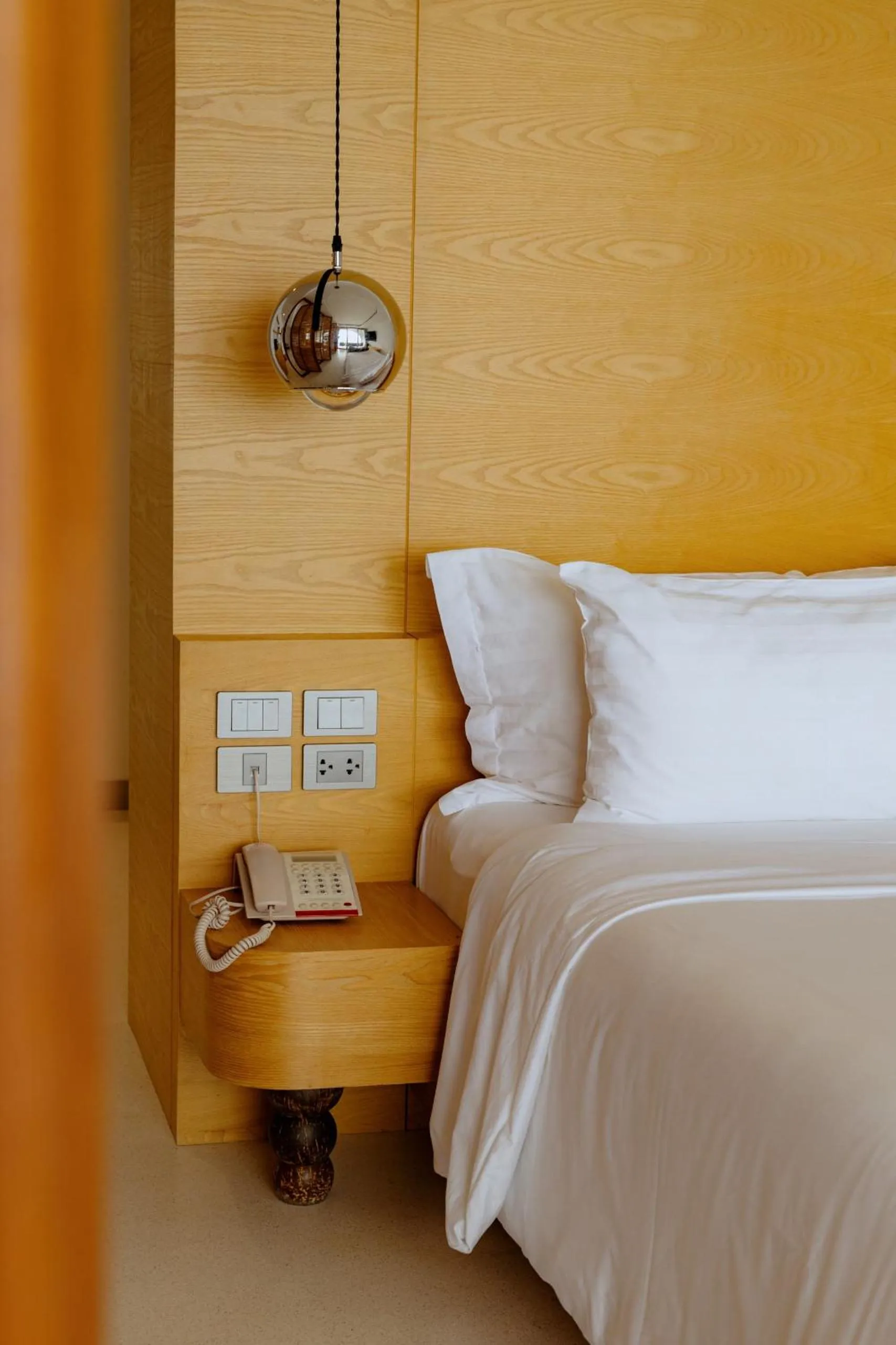 Bed in Elite Atoll Beachfront Hotel