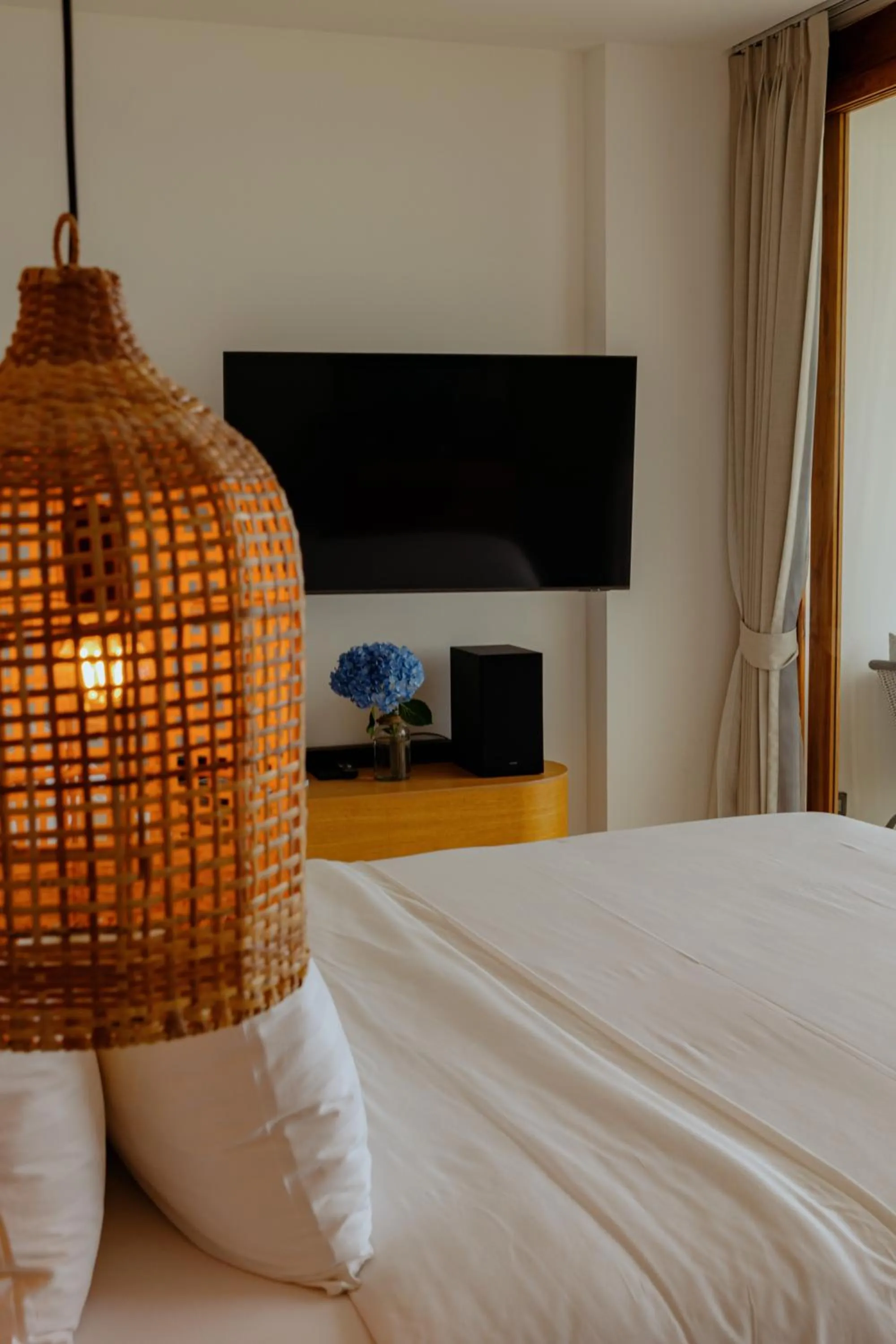 Bed in Elite Atoll Beachfront Hotel