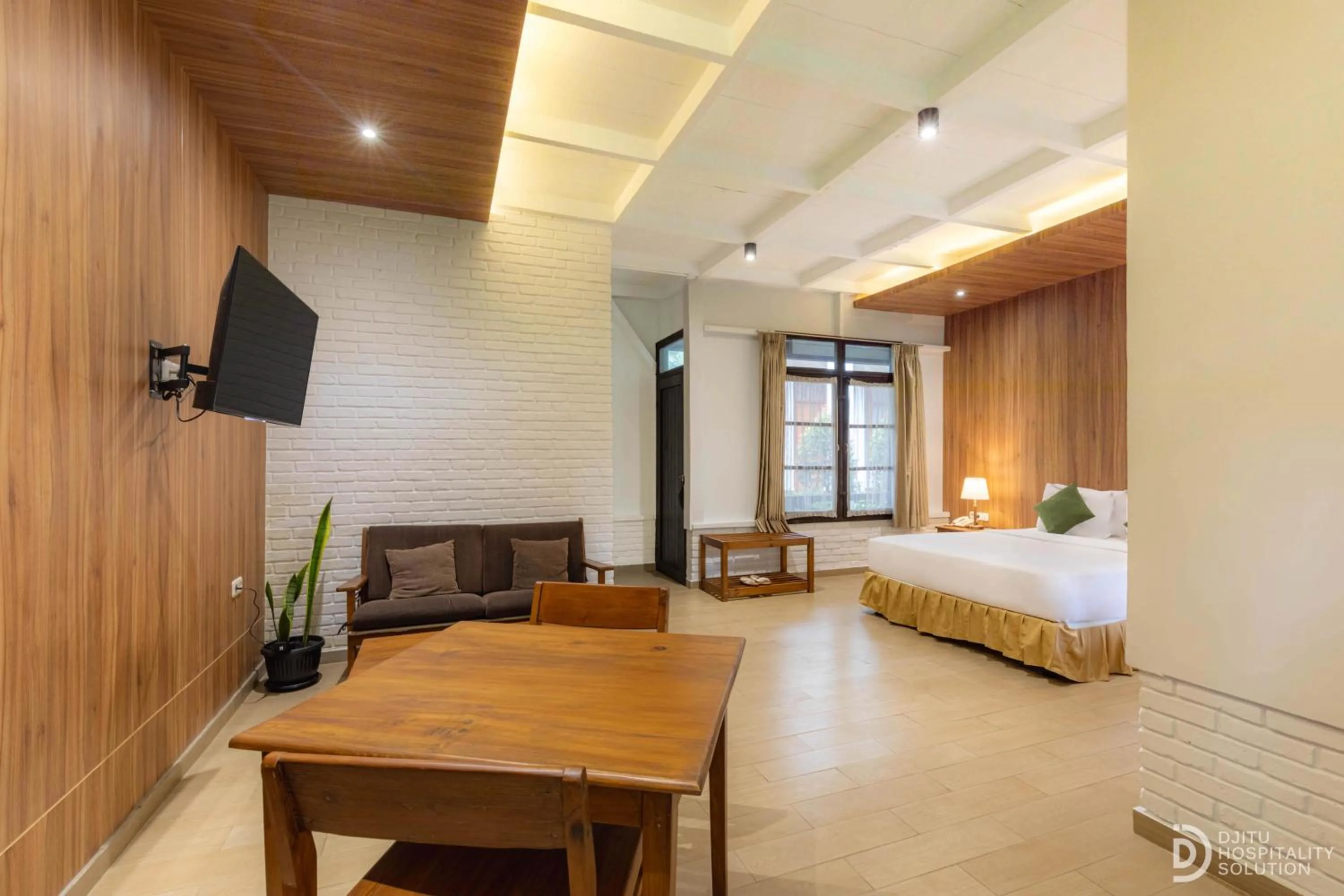 Living room, Bed in Hotel Grand Panorama Lembang