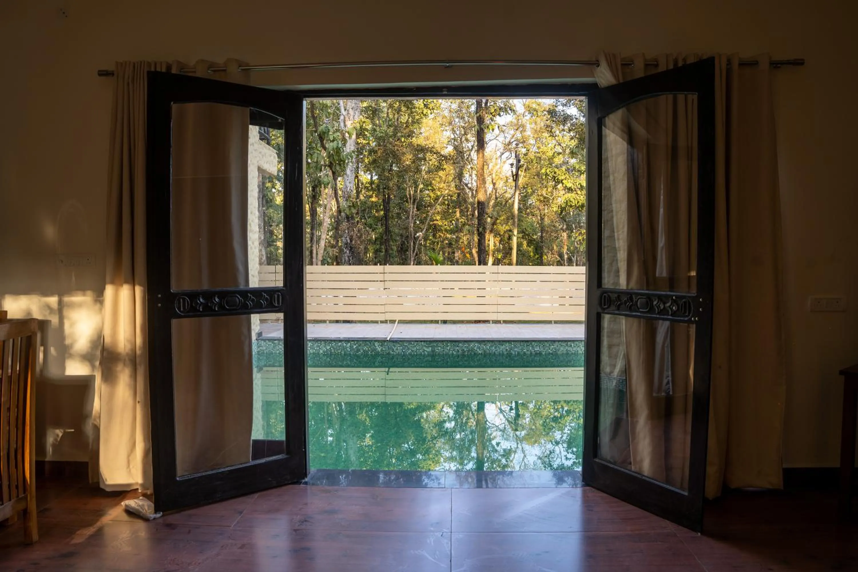 Swimming pool in Citrus Prime Kanha Resort and Villas