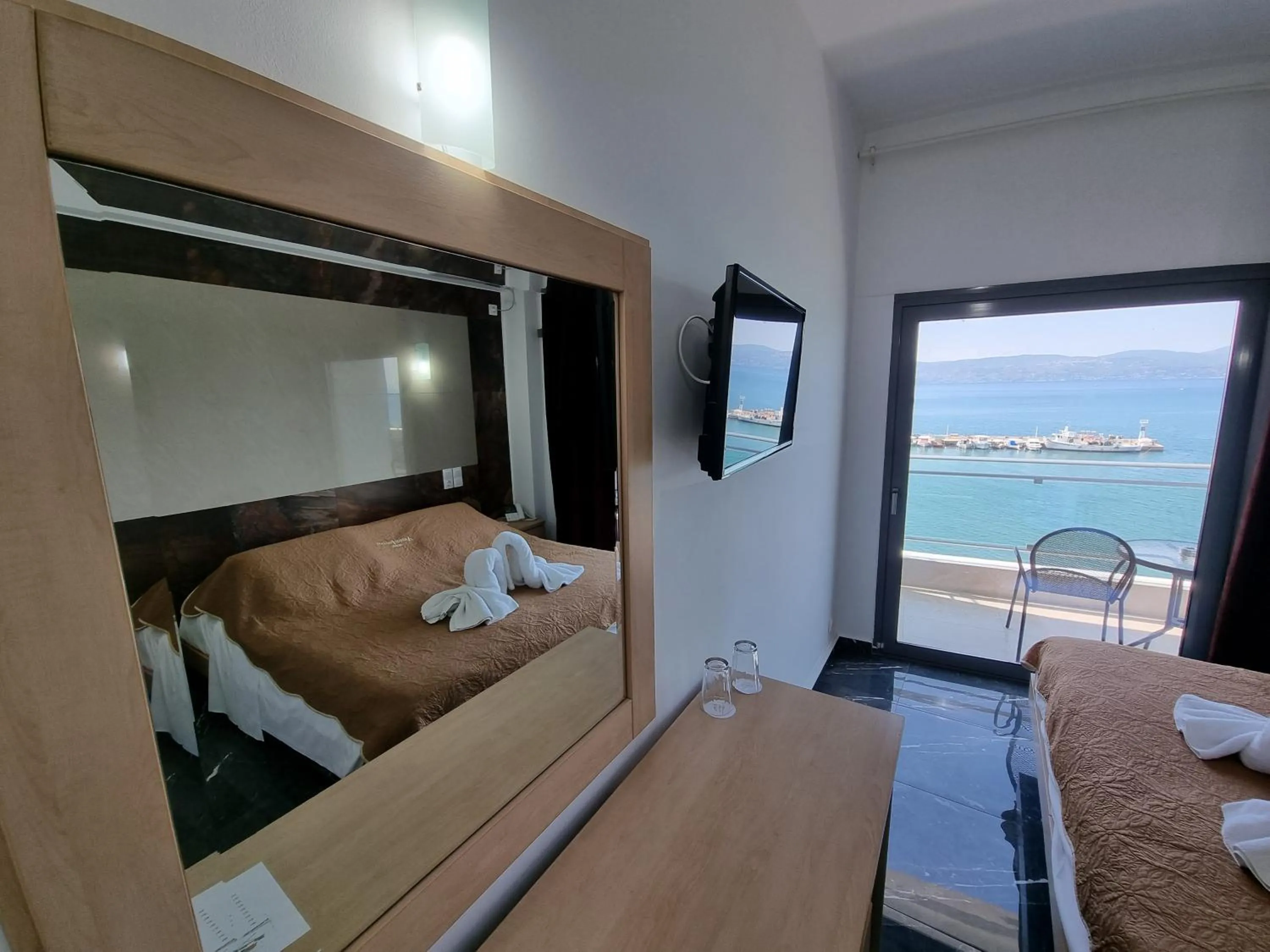 Bed in Porto Evia Boutique Hotel