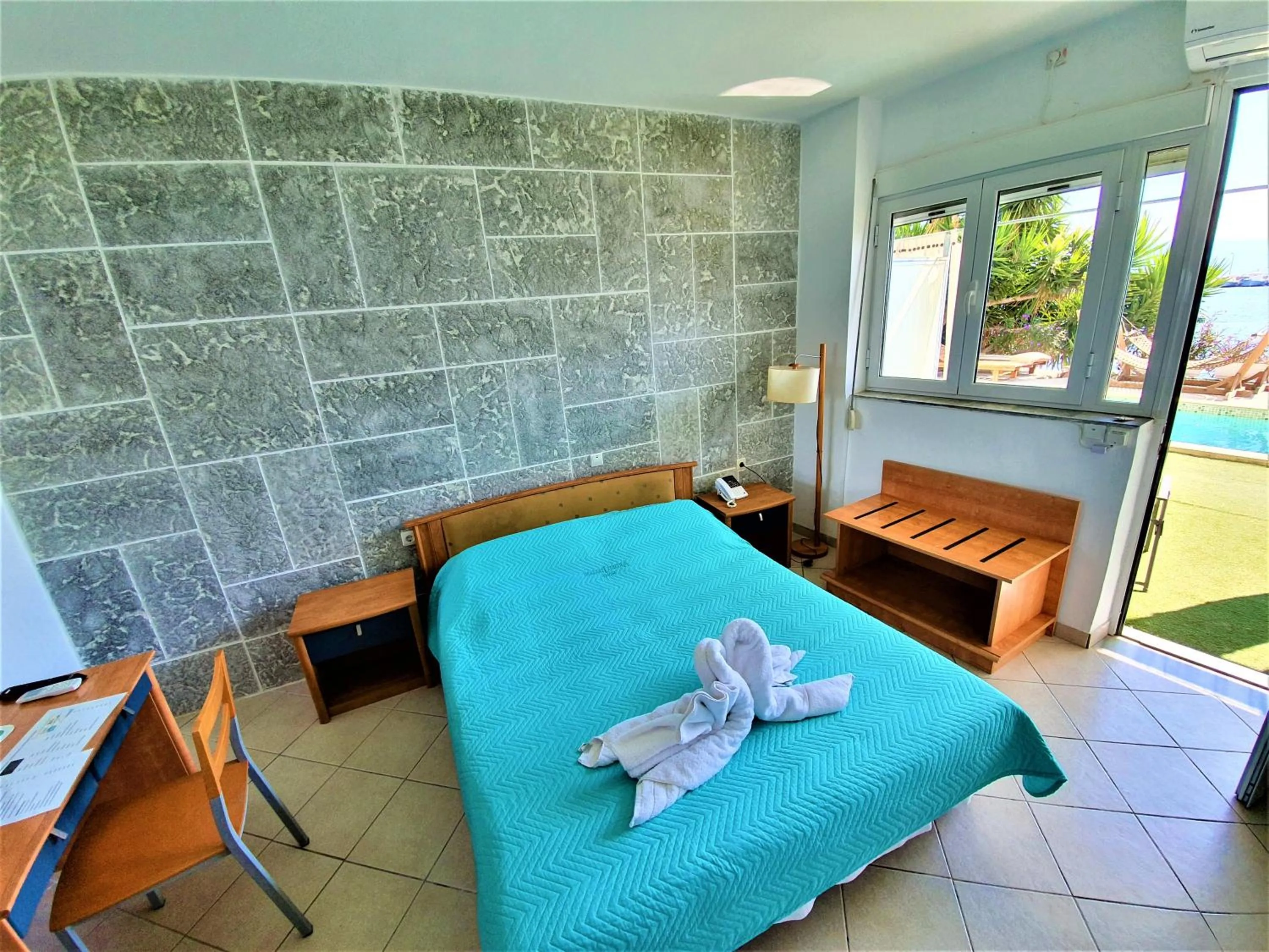 Bed in Porto Evia Boutique Hotel