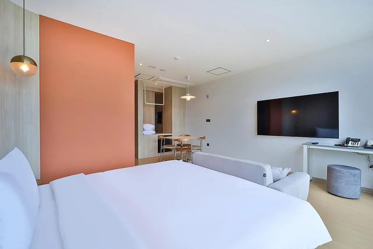 Bed in Browndot Signature Hotel