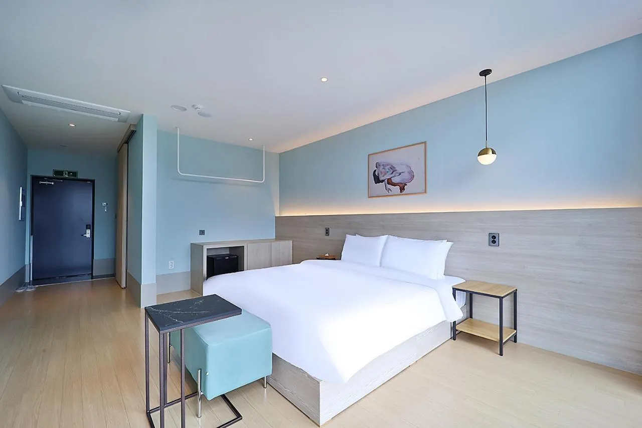 Bed in Browndot Signature Hotel