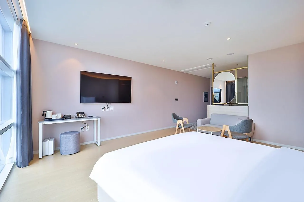 Bed in Browndot Signature Hotel