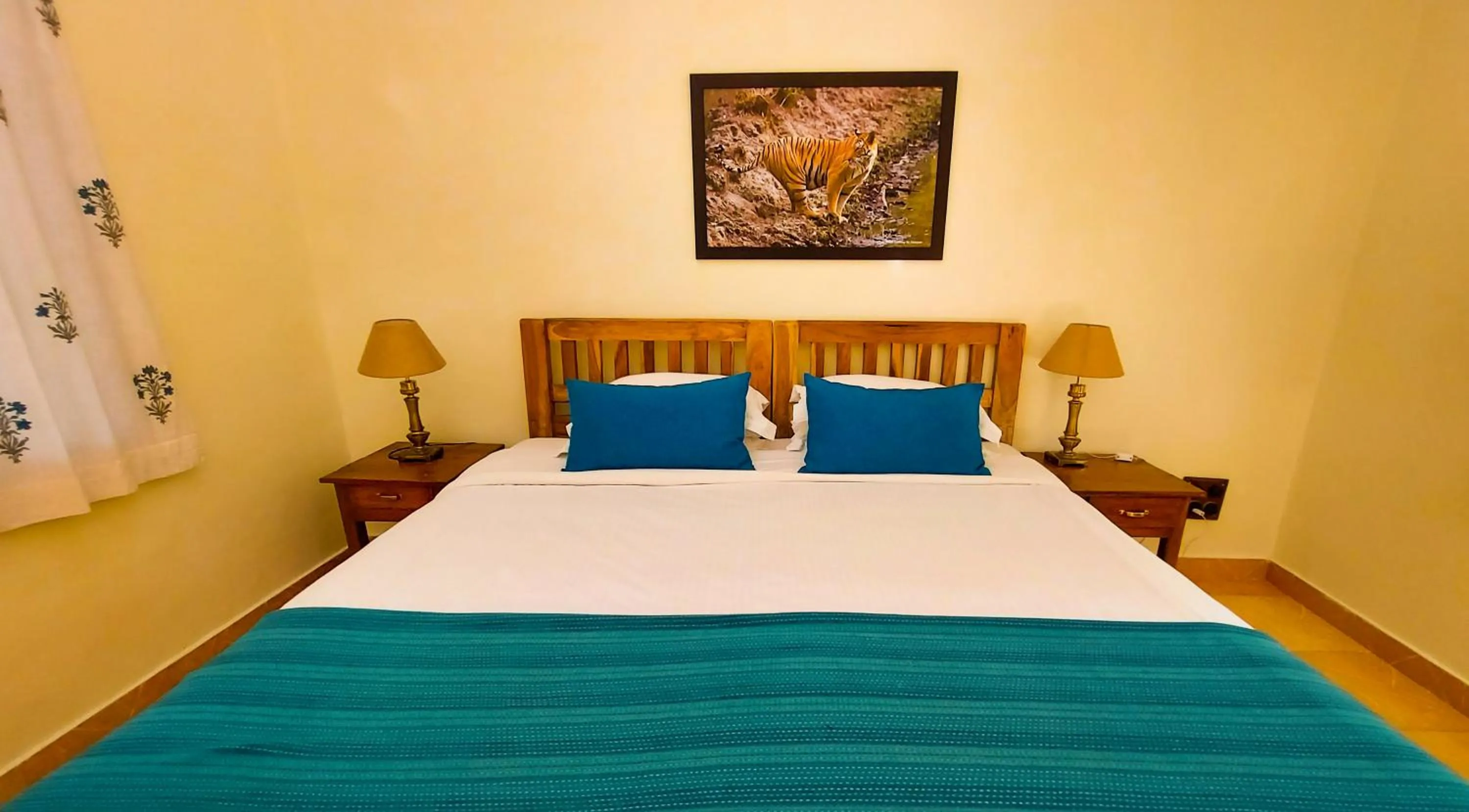 Bed in Bandhavgarh Jungle Lodge
