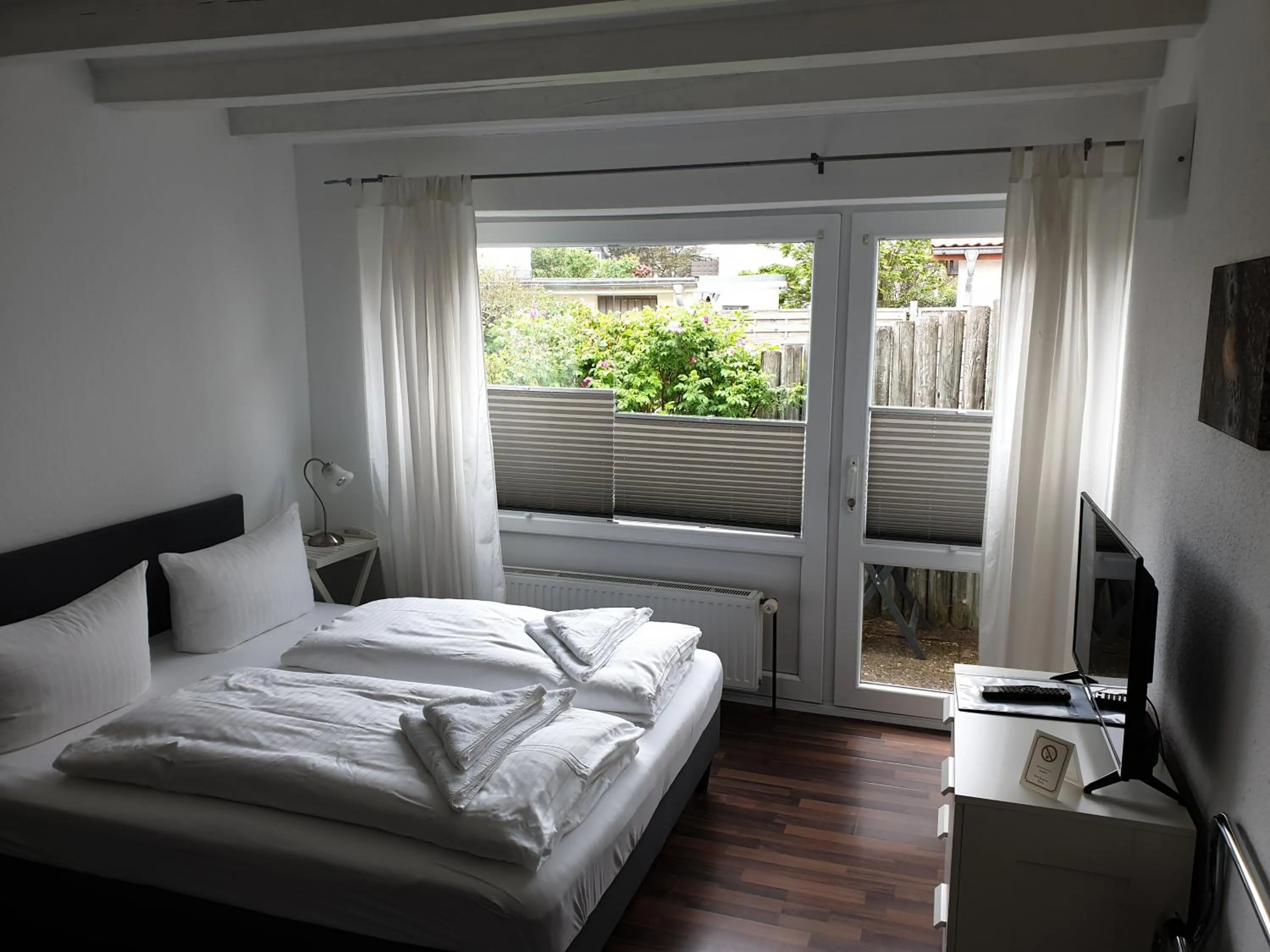 Photo of the whole room, Bed in Haus Bomhoff Sylt