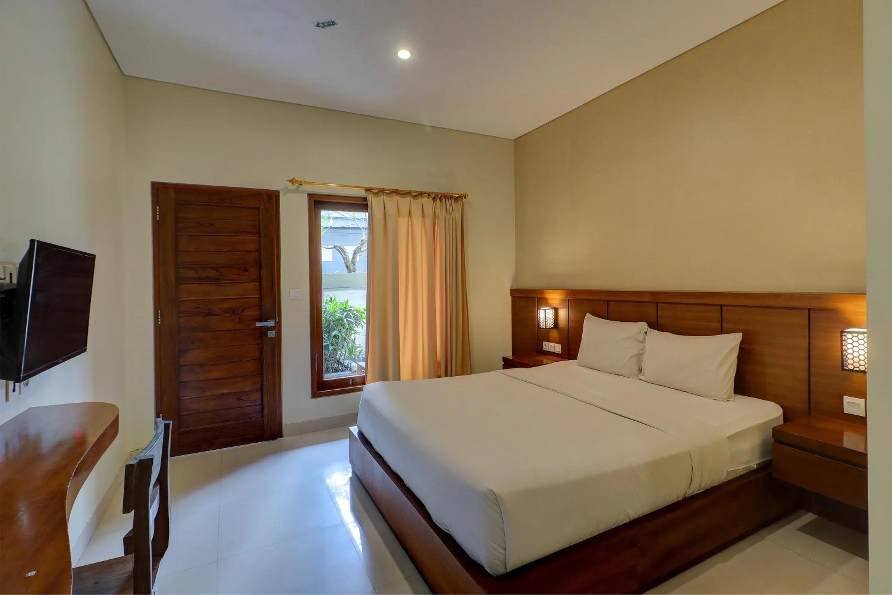 Bedroom in OYO Life 92852 Singgah Hotel Legian