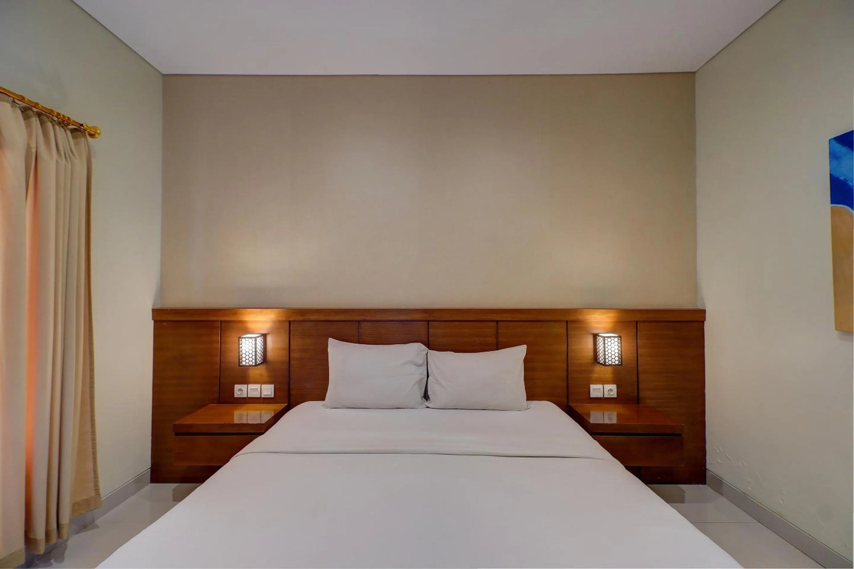 Bedroom in OYO Life 92852 Singgah Hotel Legian