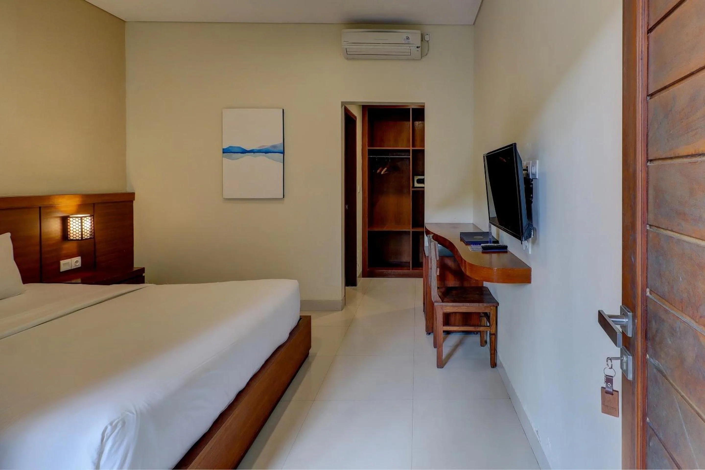 Bedroom in OYO Life 92852 Singgah Hotel Legian