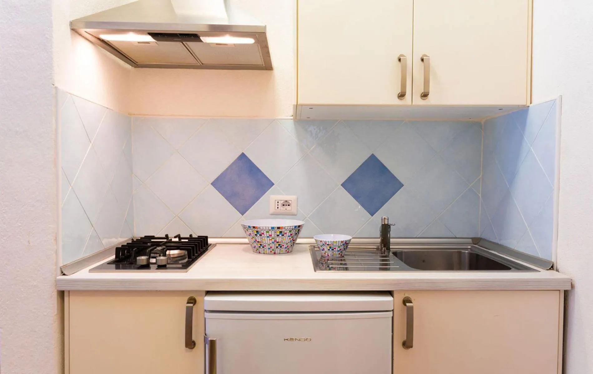 Kitchen or kitchenette in Camping Village Capo D'Orso