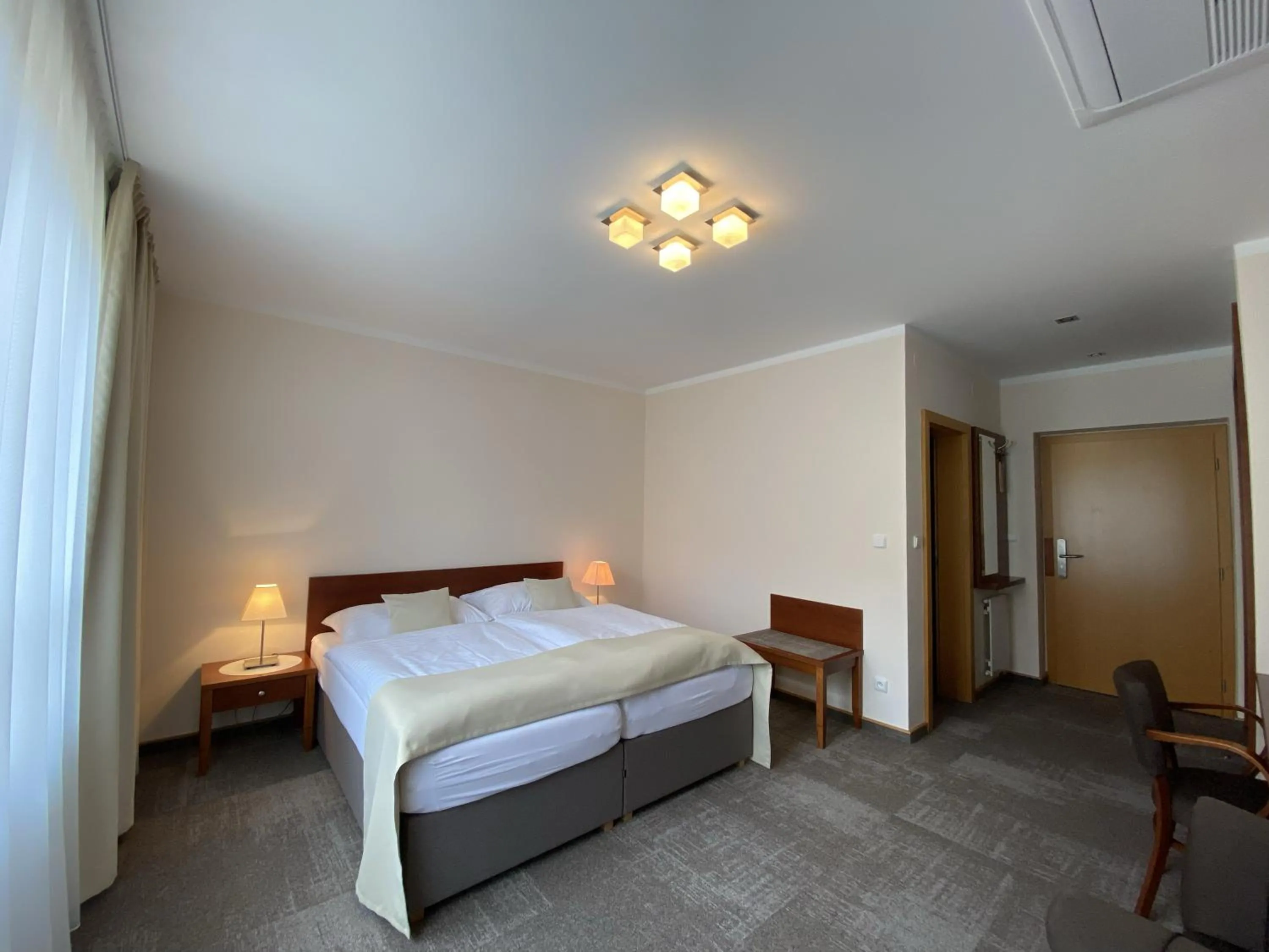 Bed in Golf Hotel Austerlitz