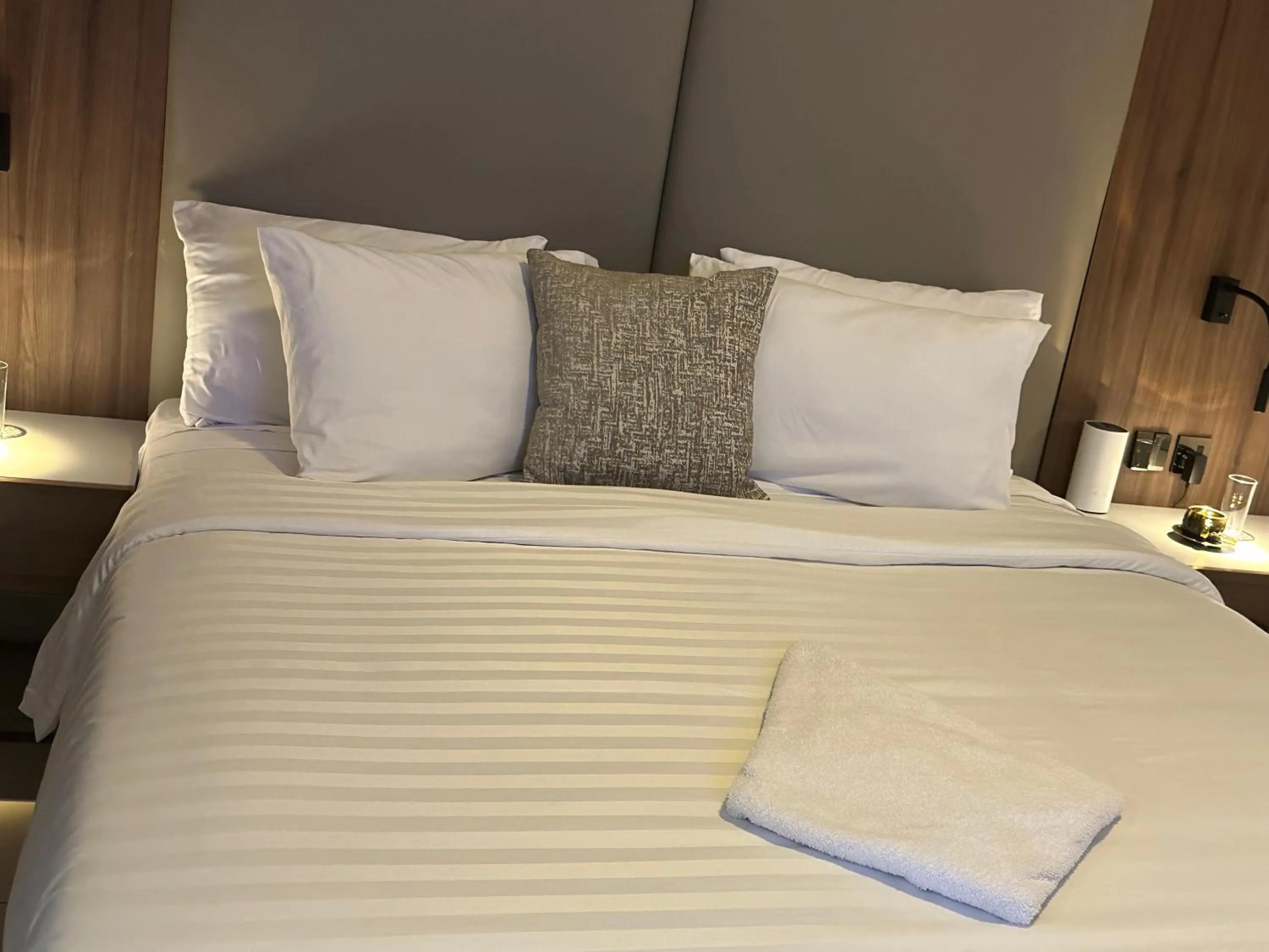 Bed in Guided Hospitality - Luxury Accommodations