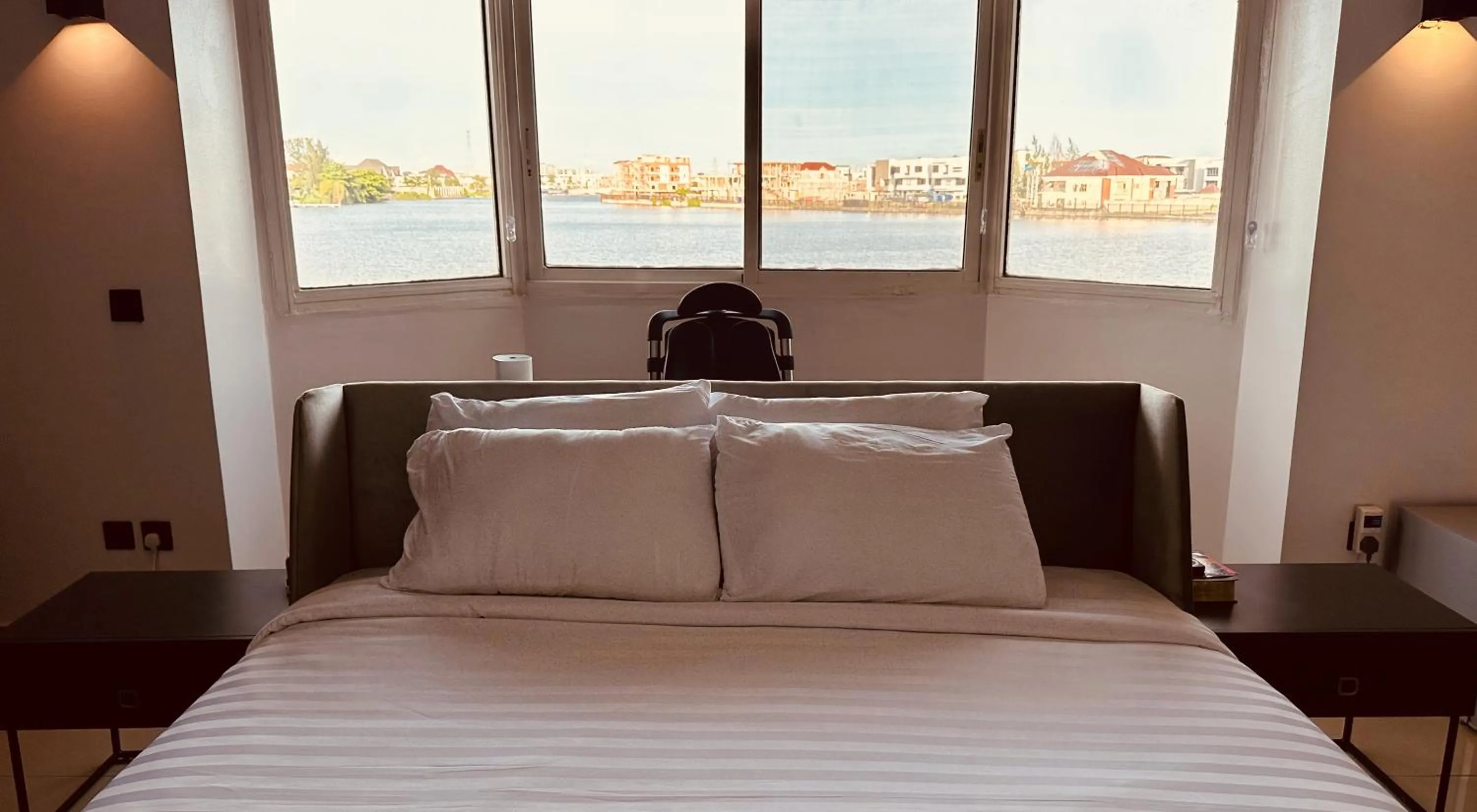 Bed in Guided Hospitality - Luxury Accommodations