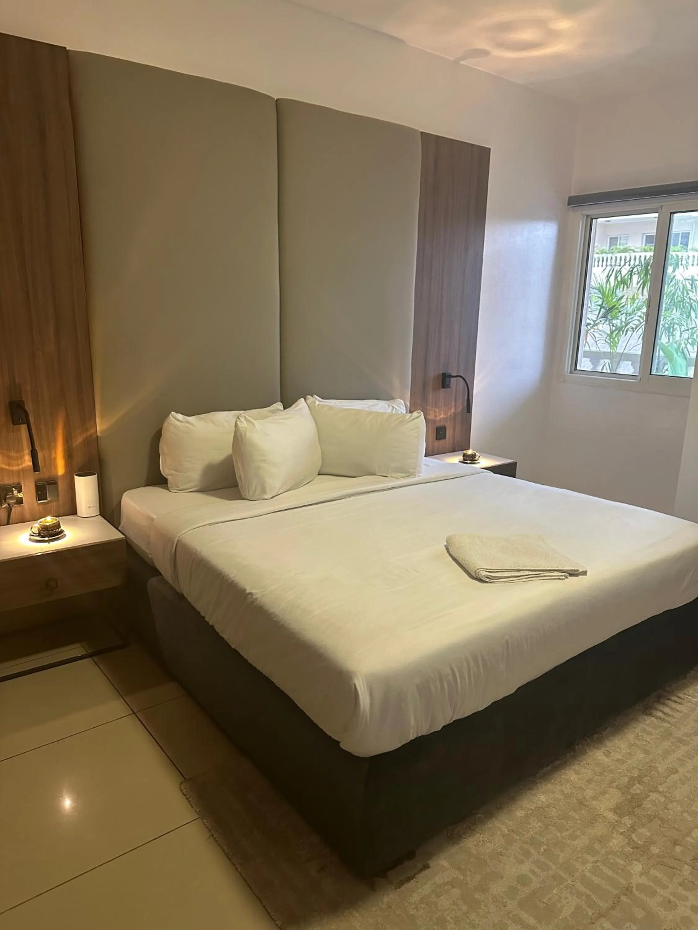 Bed in Guided Hospitality - Luxury Accommodations