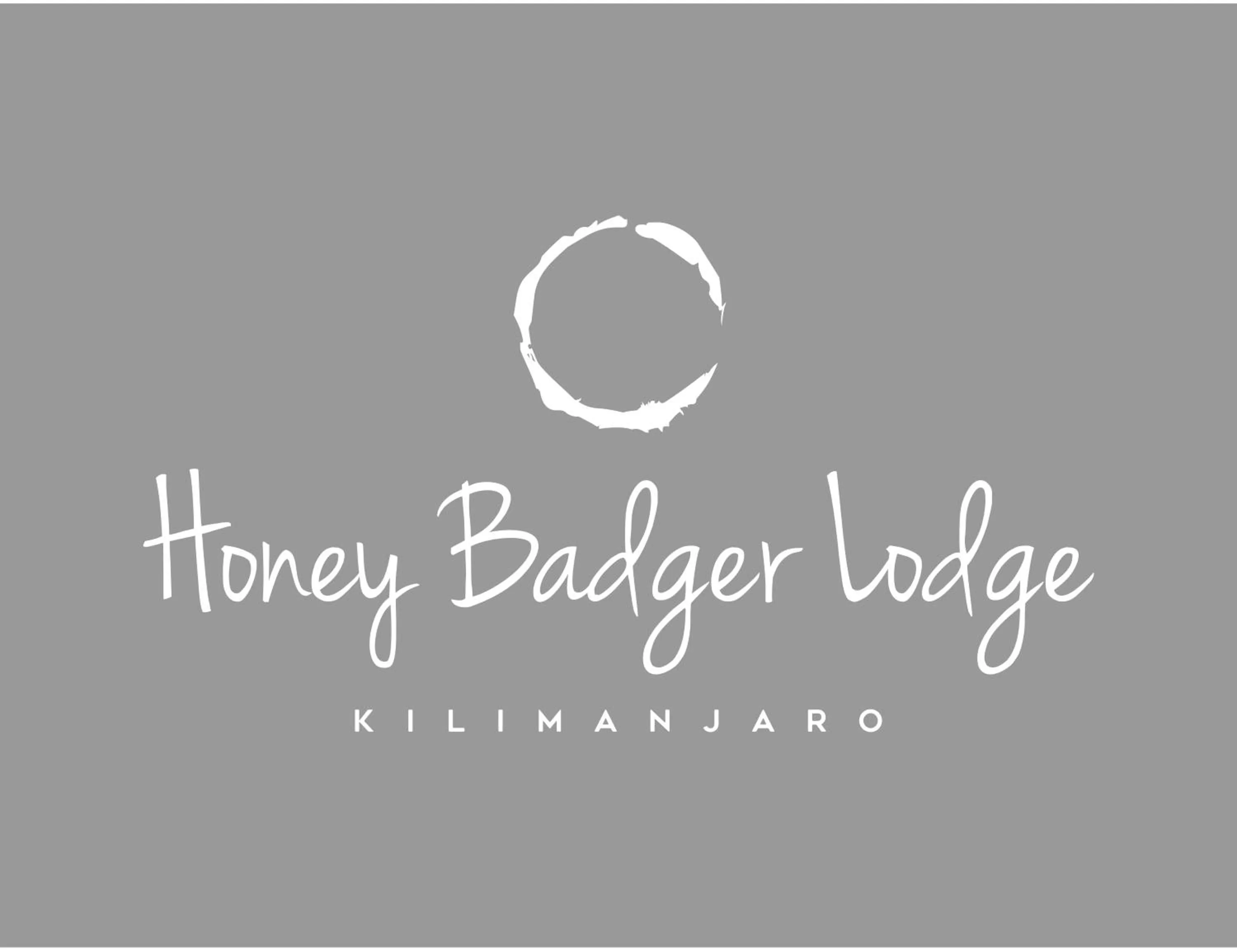 Property logo or sign in Honey Badger Lodge