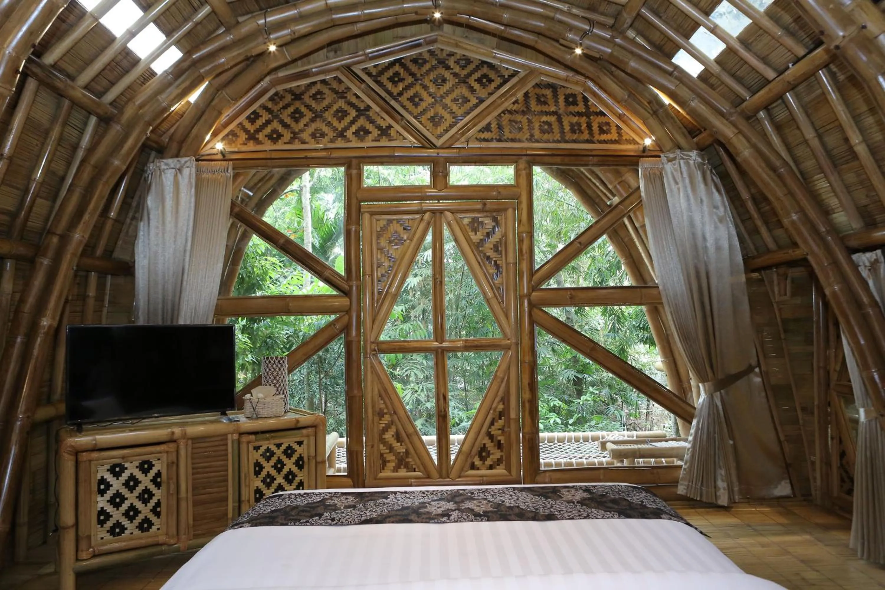 Bed in The Osing Bamboo Resort - a LIBERTA Collection