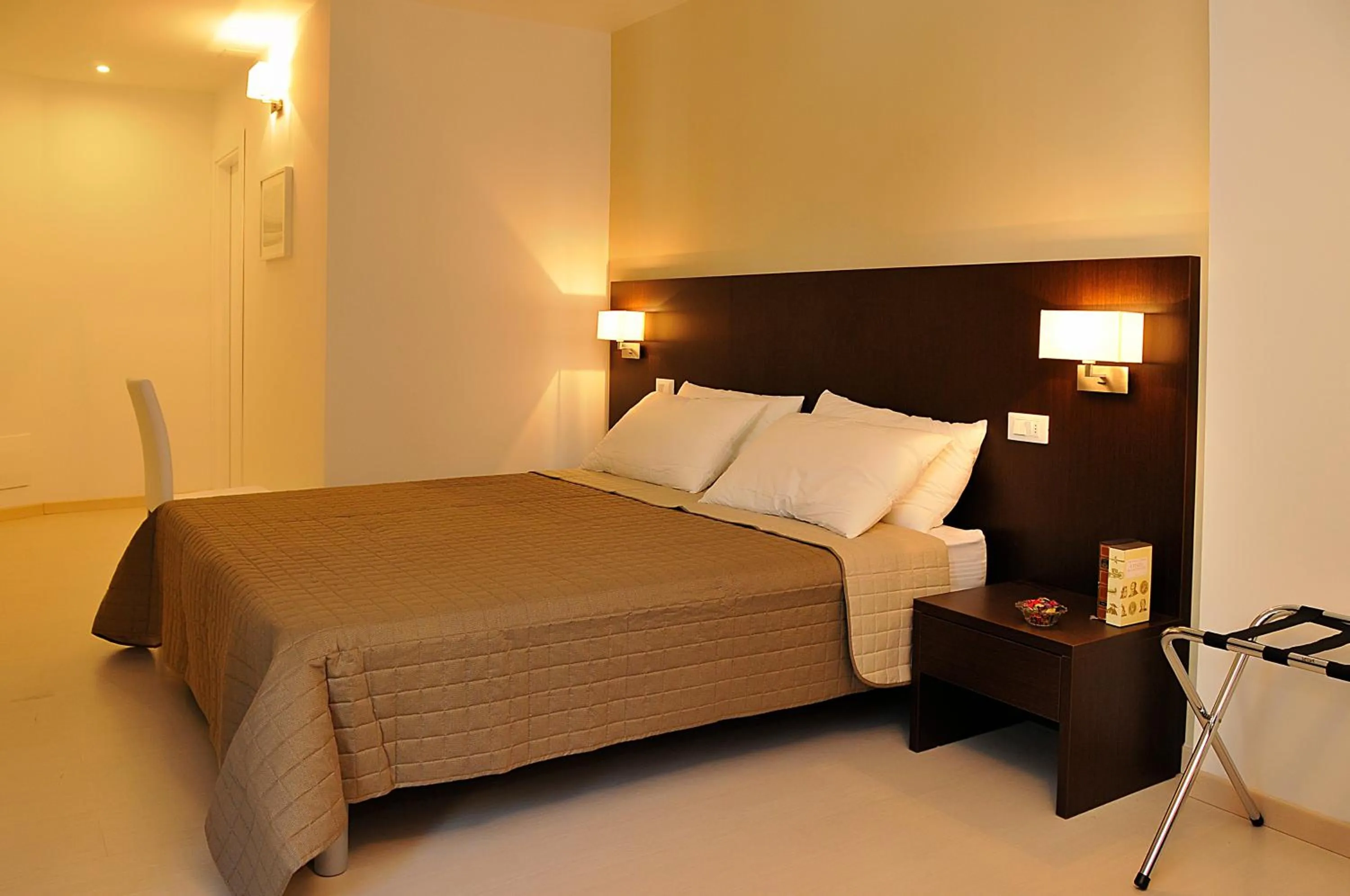 Photo of the whole room, Bed in Le Stanze Sul Corso