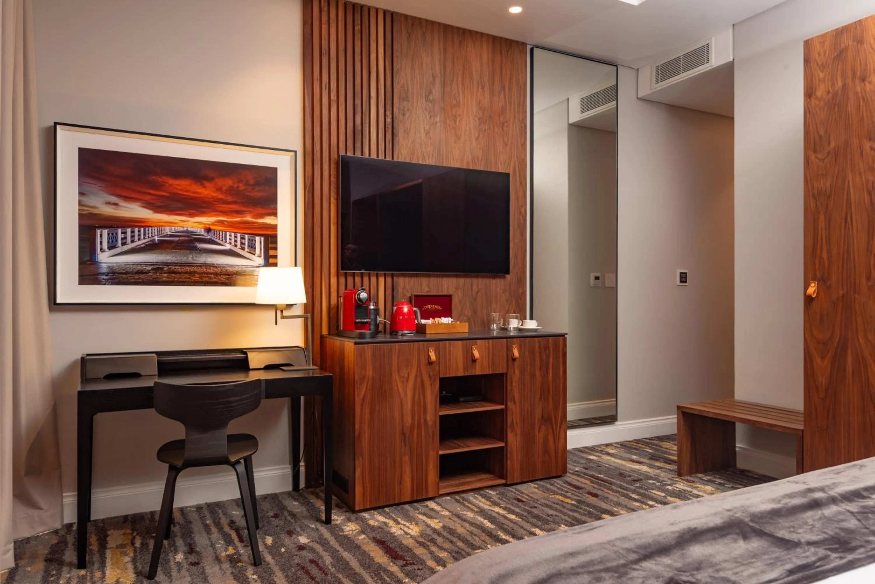 Communal lounge/ TV room in Anfani Boutique Hotel