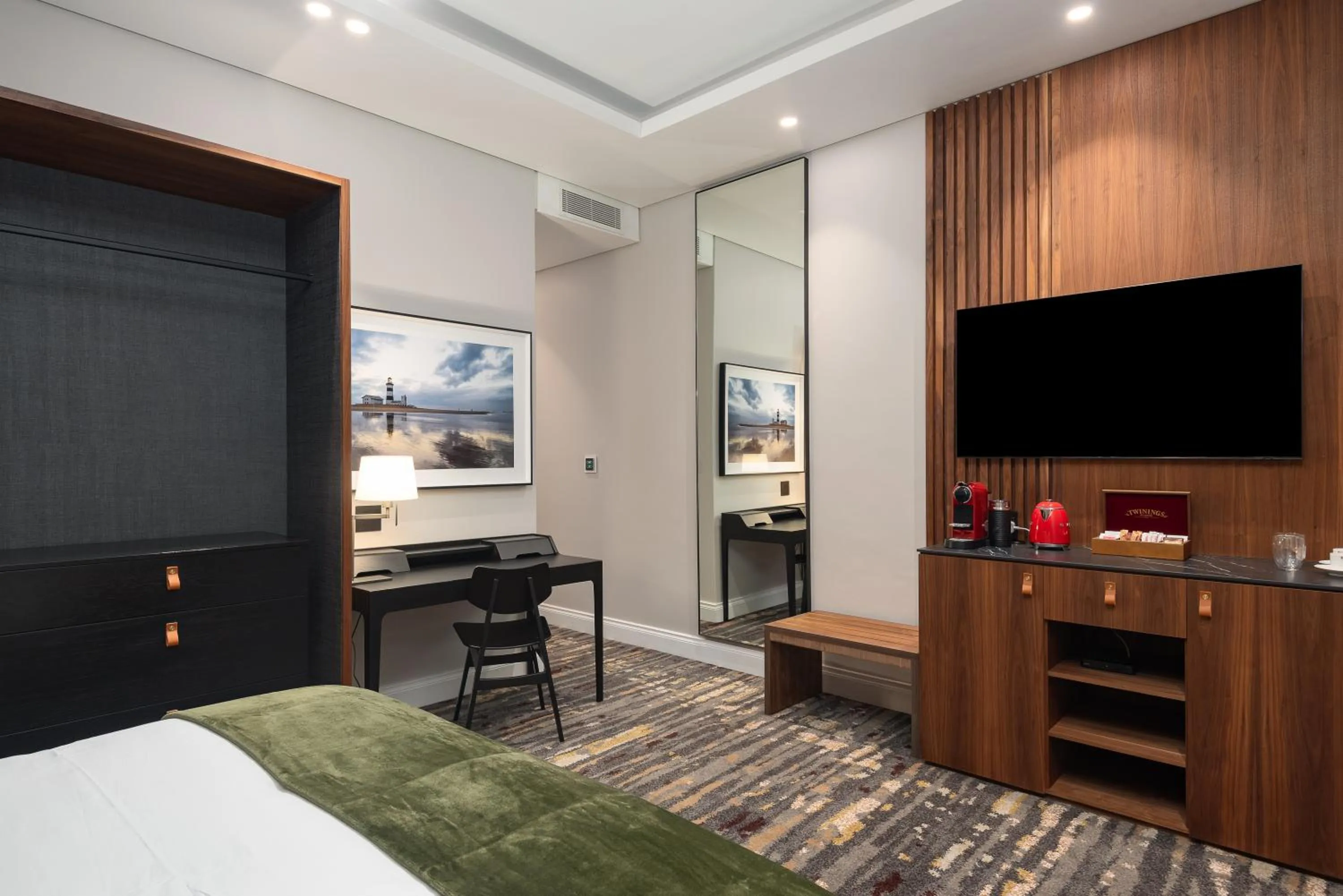 Communal lounge/ TV room in Anfani Boutique Hotel