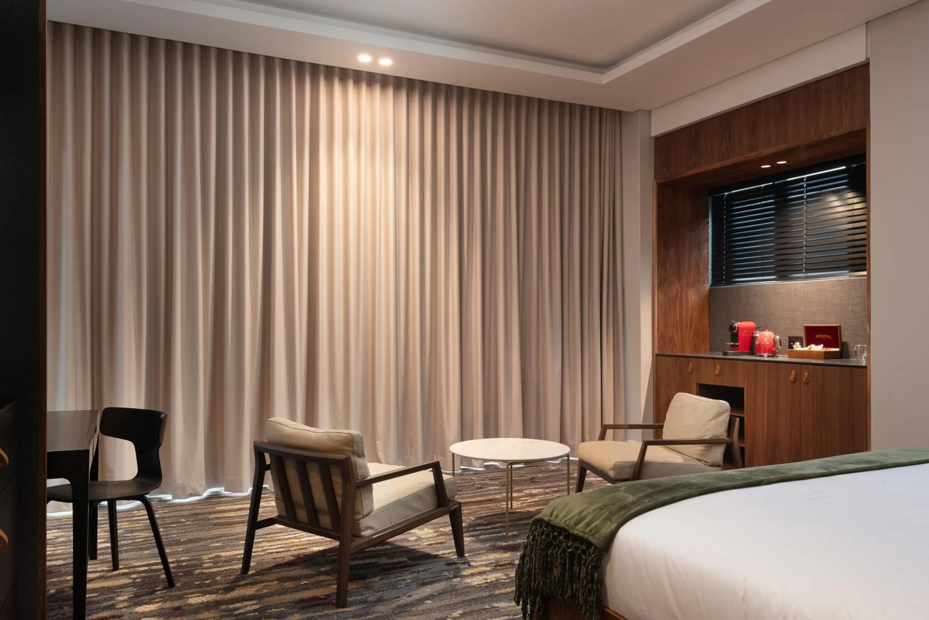 Bed in Anfani Boutique Hotel