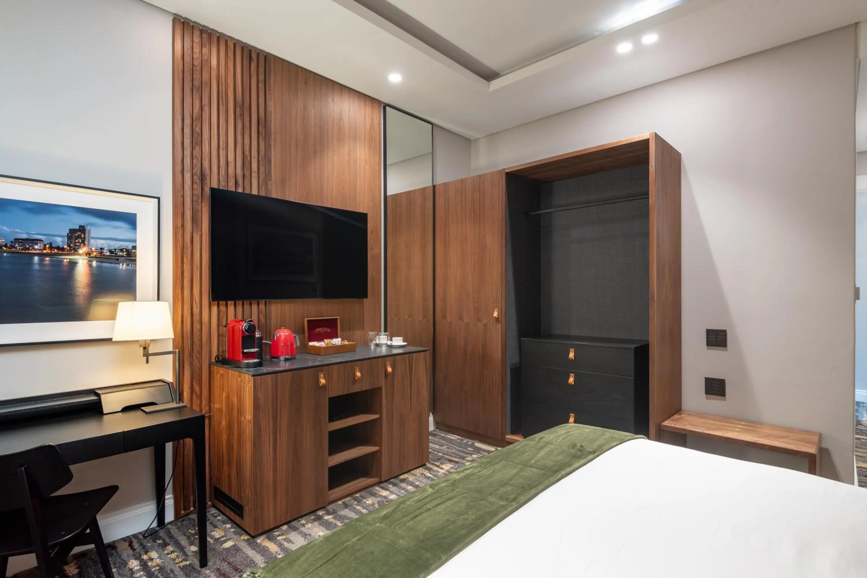 Communal lounge/ TV room in Anfani Boutique Hotel