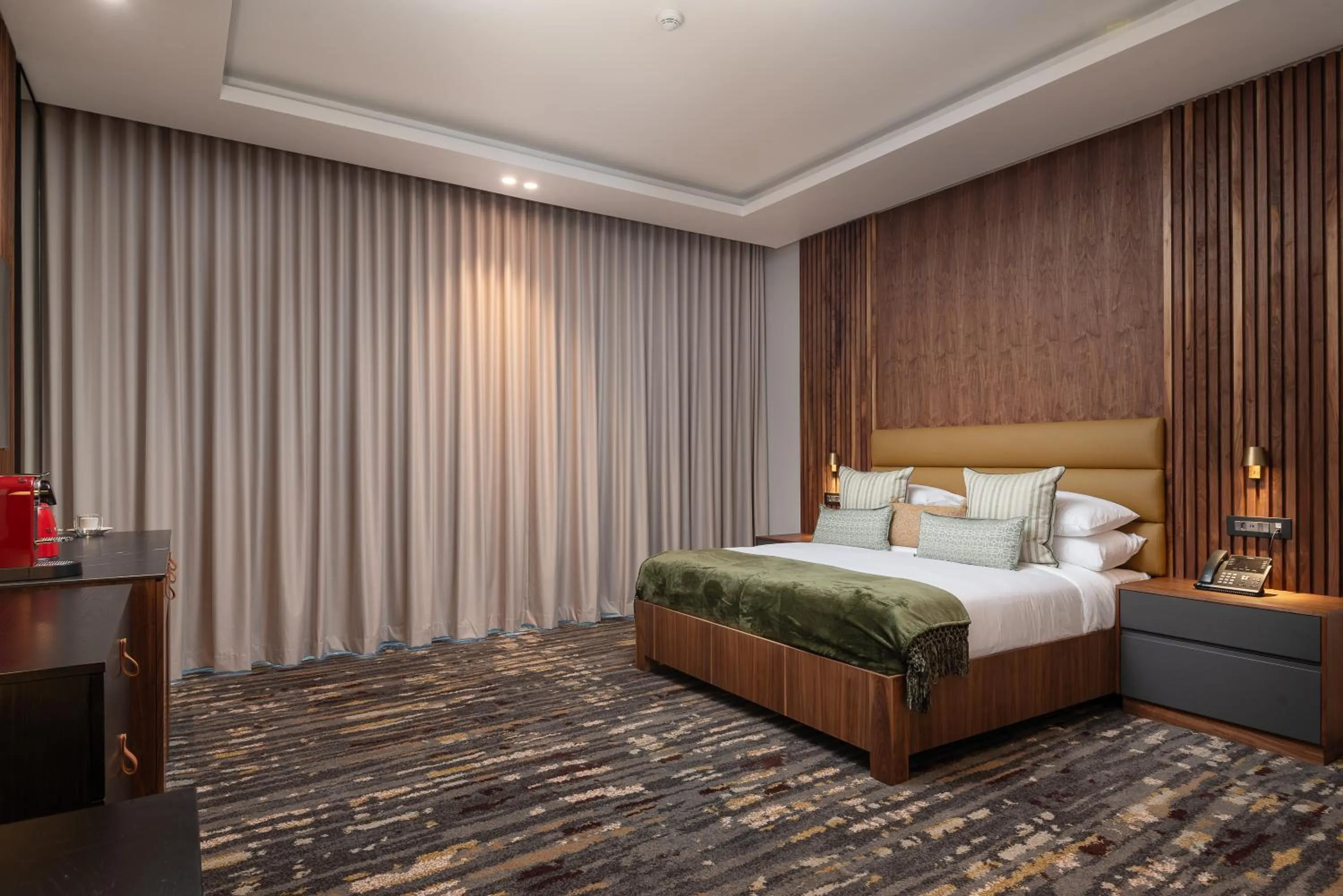 Bed in Anfani Boutique Hotel