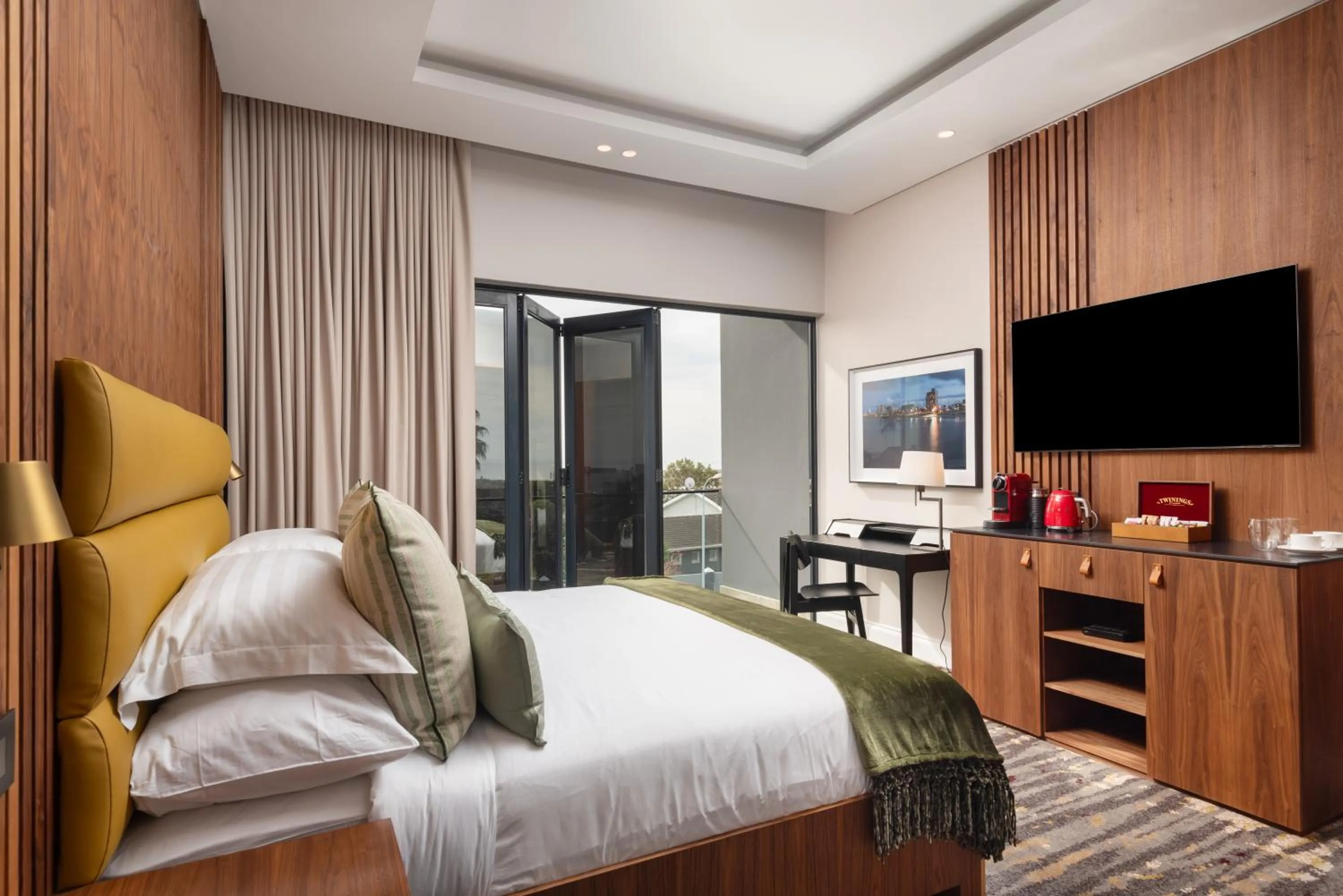 Communal lounge/ TV room in Anfani Boutique Hotel