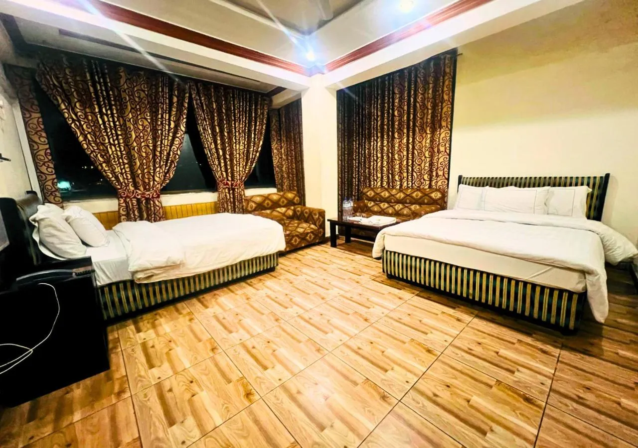 Bed in New Islamabad Hotel
