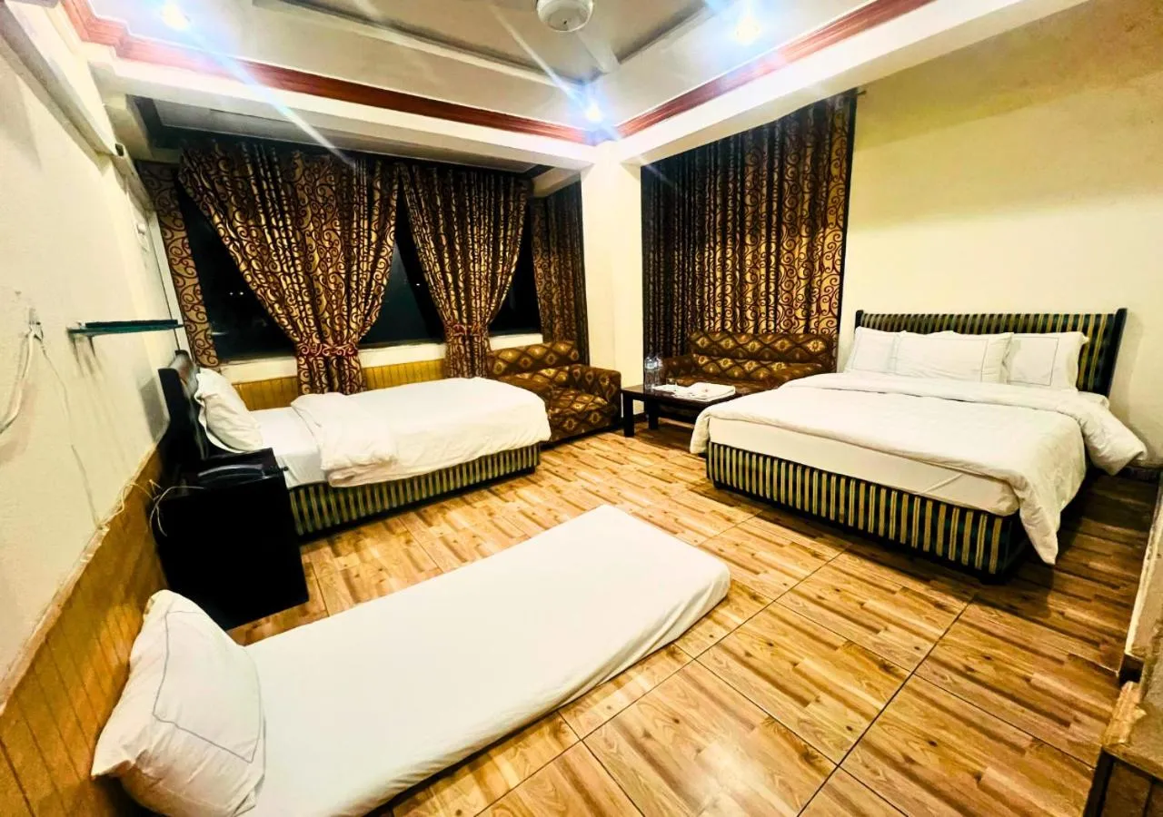 Bed in New Islamabad Hotel