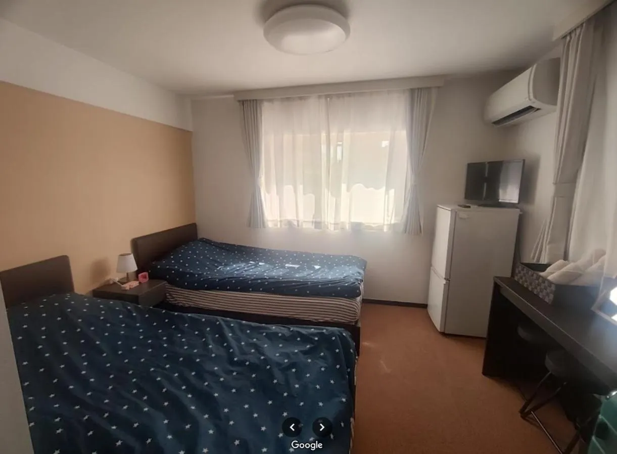 Bed in Hotel Yuni Star-Club