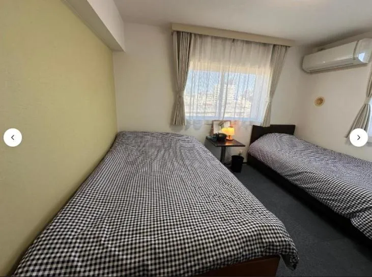 Bed in Hotel Yuni Star-Club