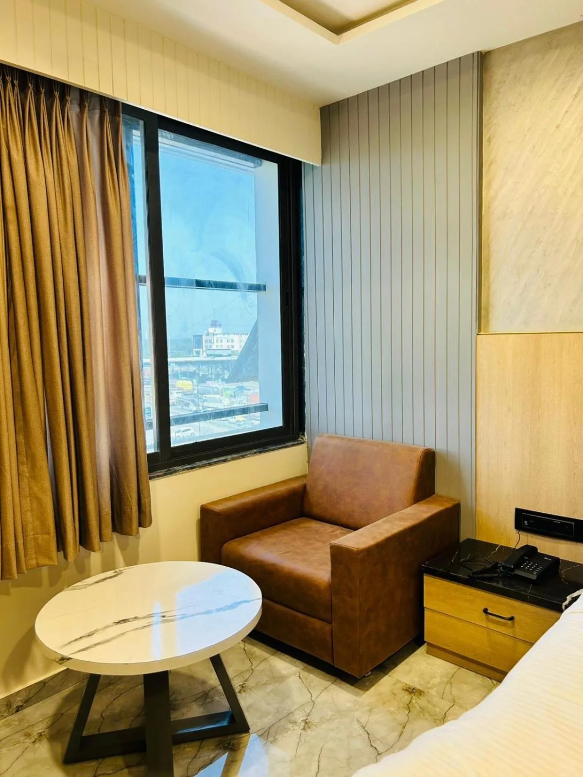 Bed in Hotel Marigold Naroda