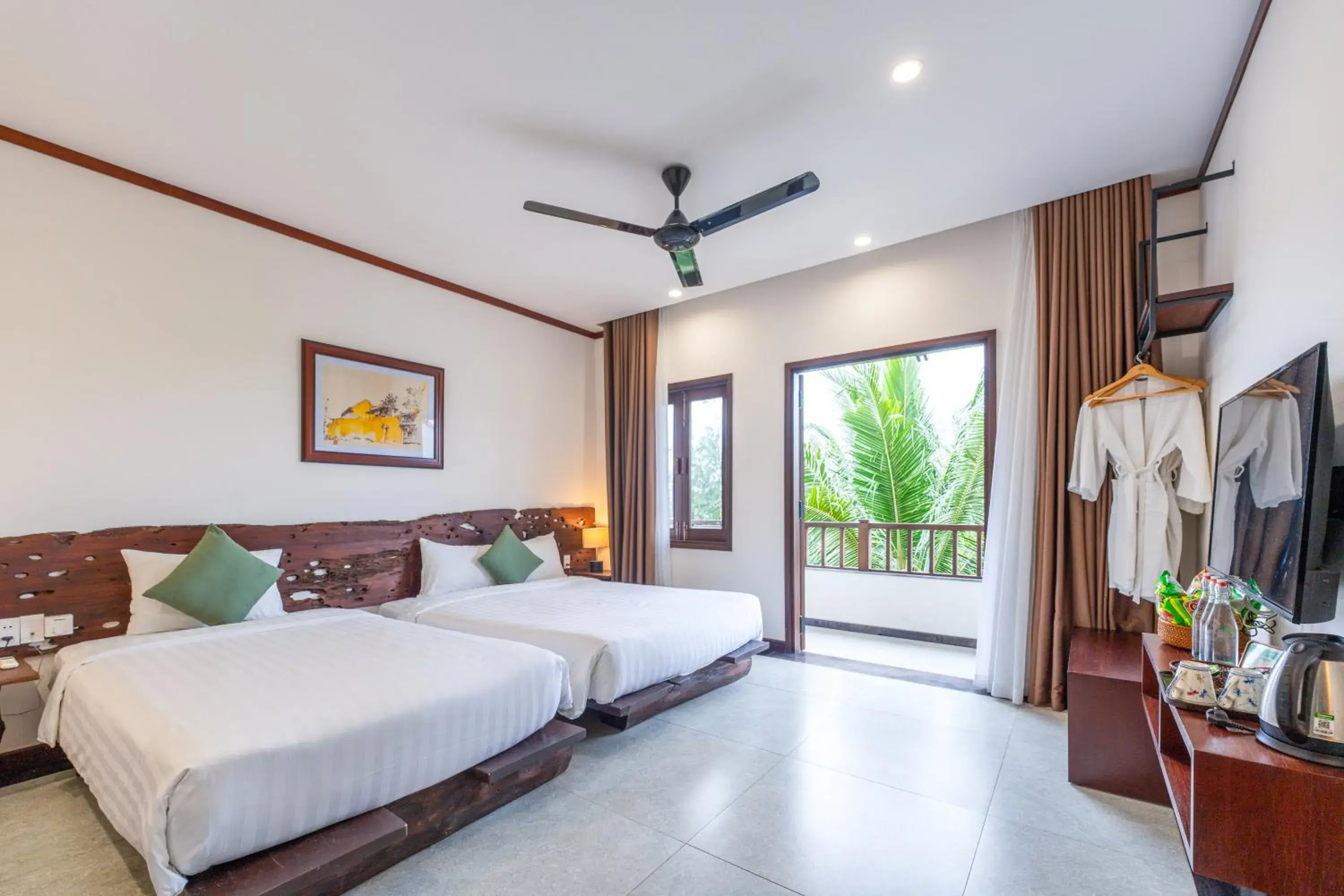Deluxe Triple Room with Palm View in Mayci Eco Boutique Hotel Hoi An Deluxe Triple Room with Palm View in Mayci Eco Boutique Hotel Hoi An