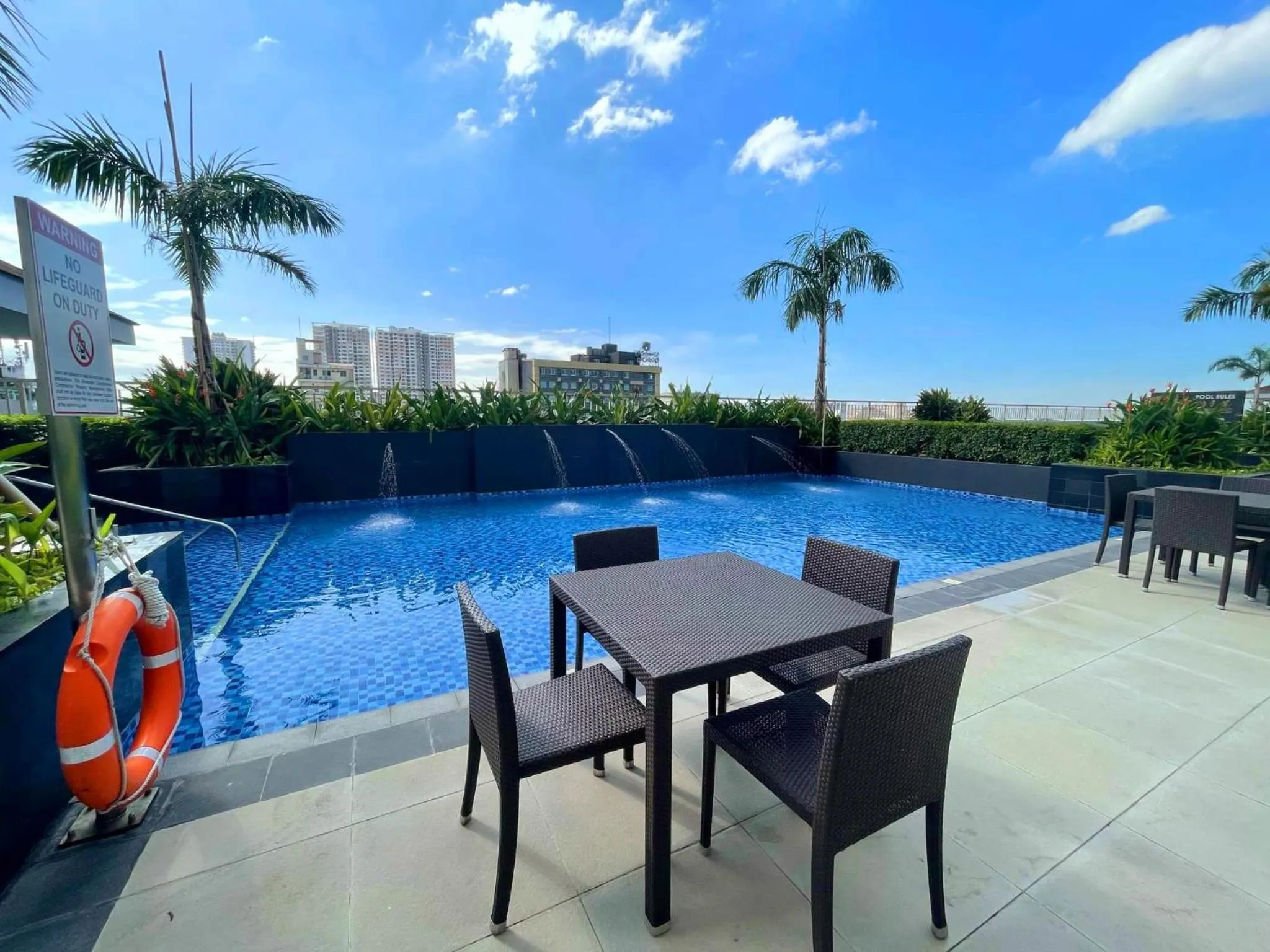 Swimming pool in Cozy Penthouse 2BR Suite w Balcony - Amazing Manila Bay View and City Skyline near MOA