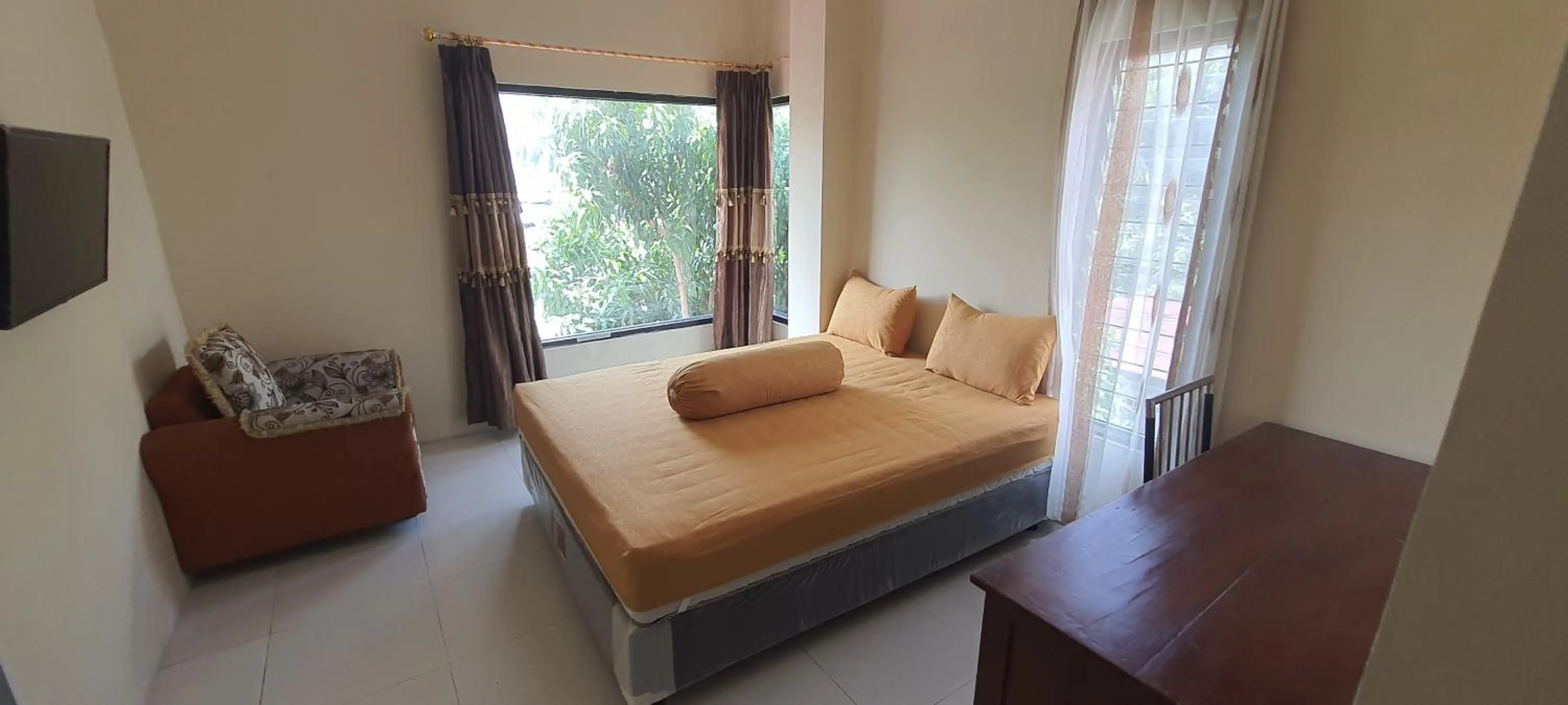 Bed in Solo Nadamax City Guest House Syariah
