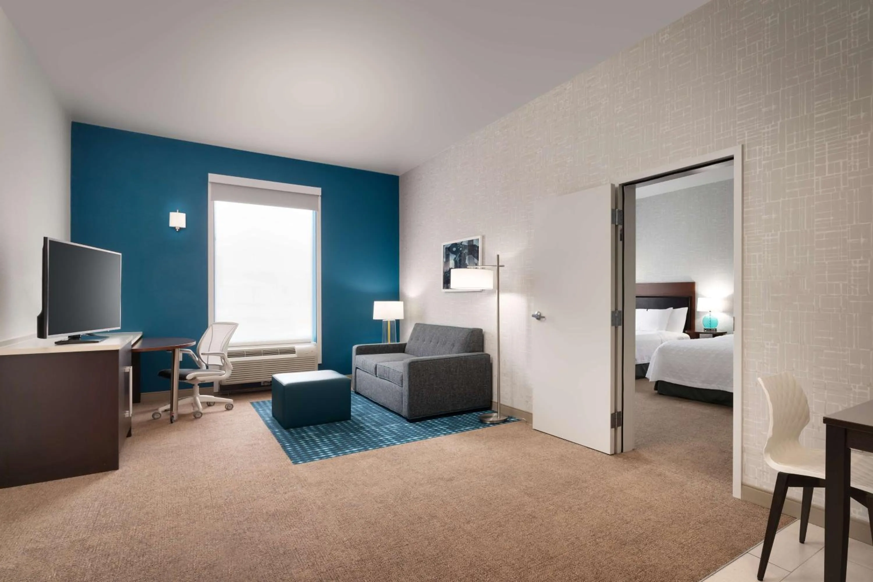 Living room, Bed in Home2 Suites by Hilton Houston Katy