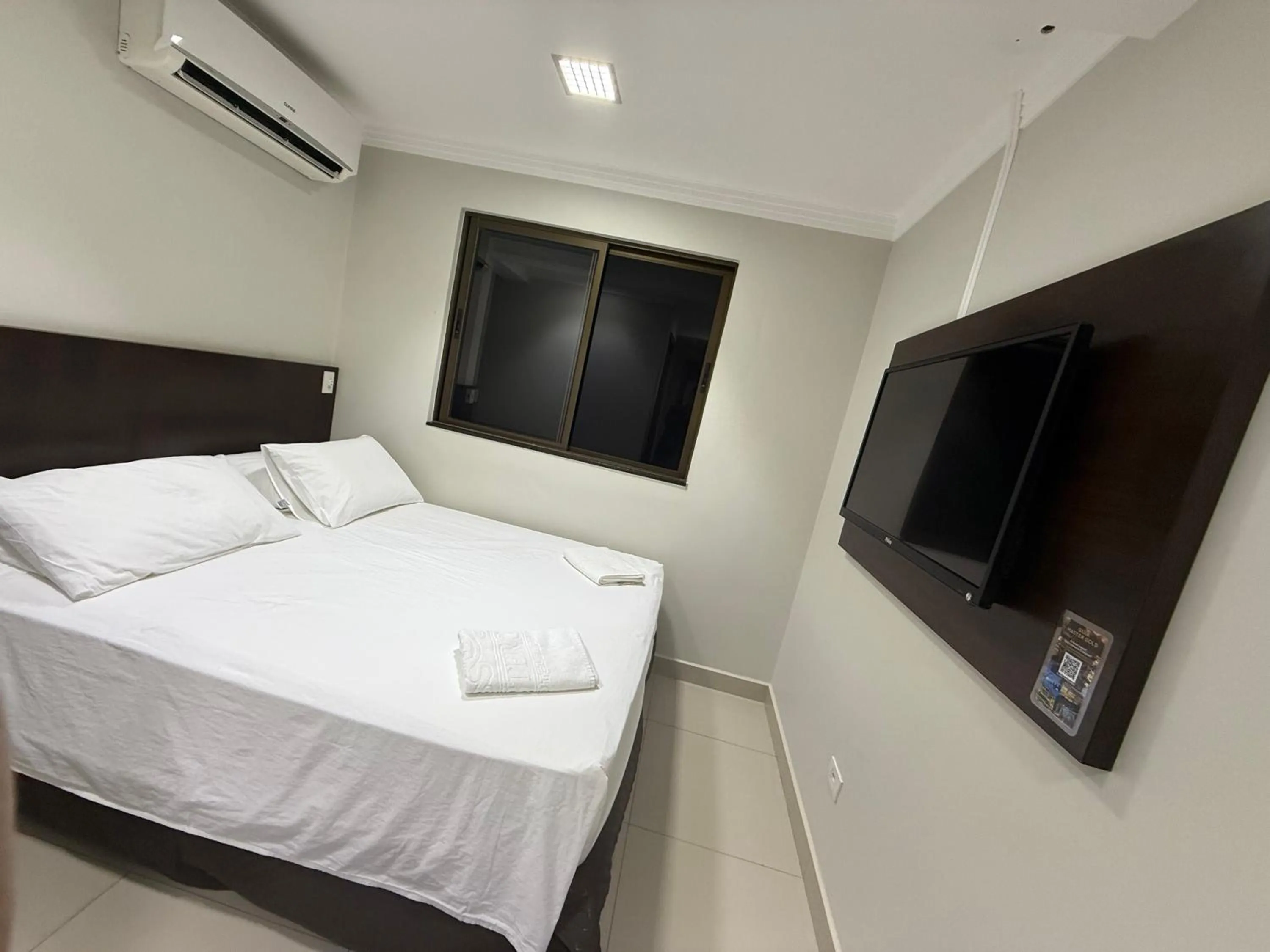 Bed in Master Gold Hotel Express