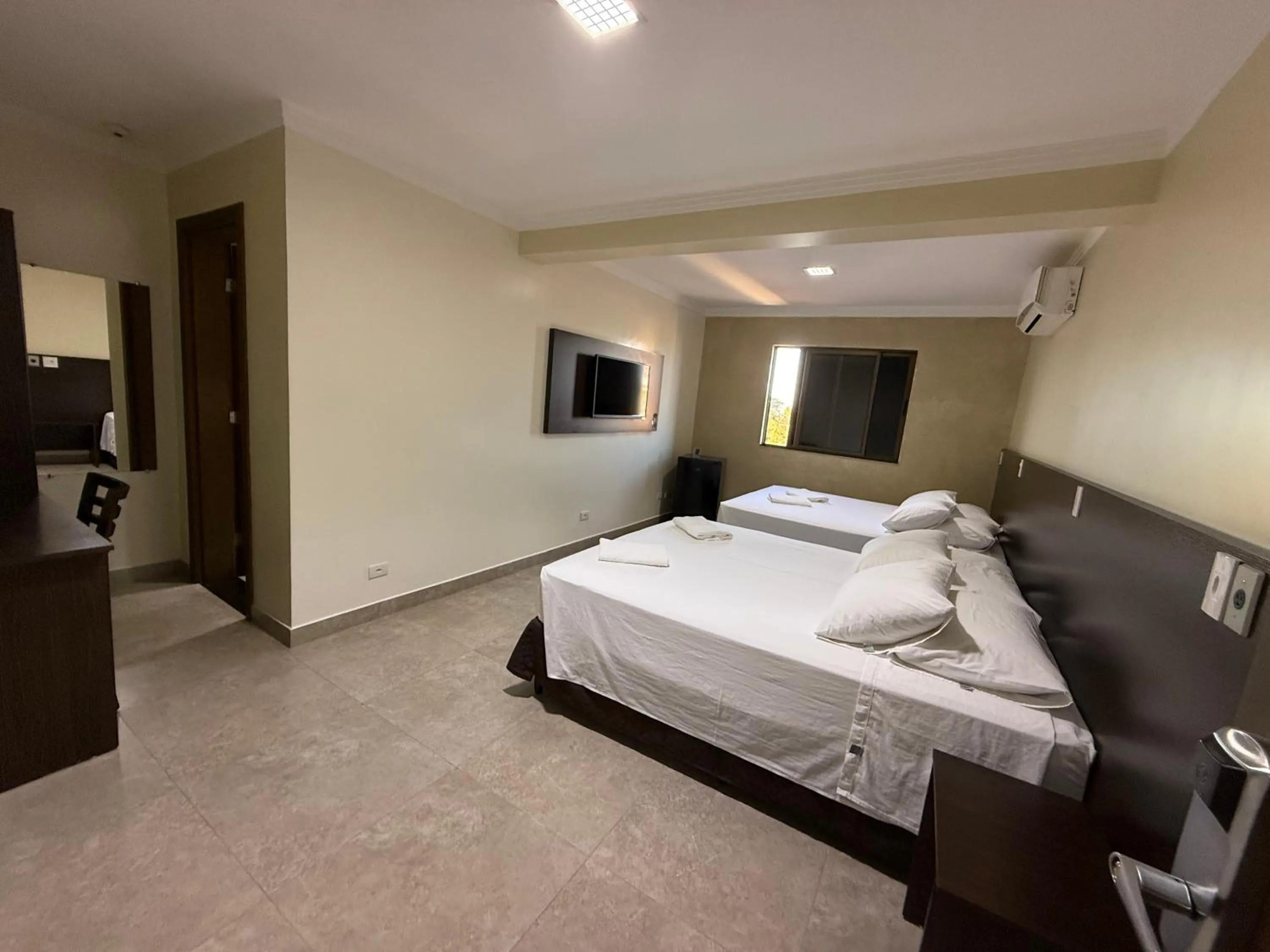 Bed in Master Gold Hotel Express