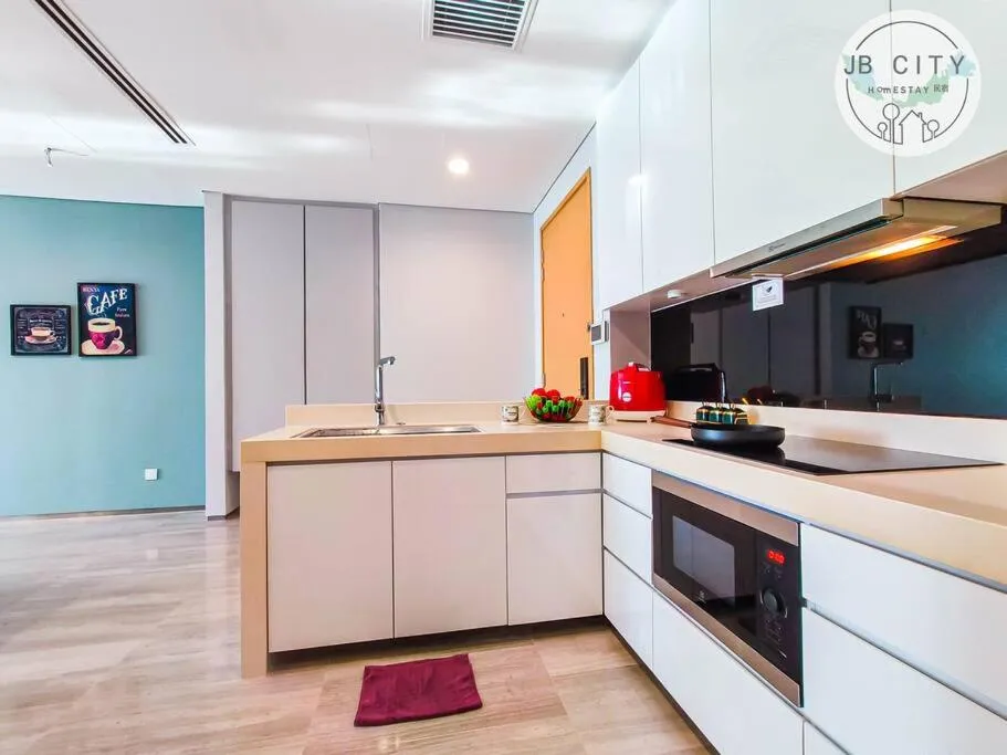 Kitchen or kitchenette in Pine Tree Suites by RR JBcity