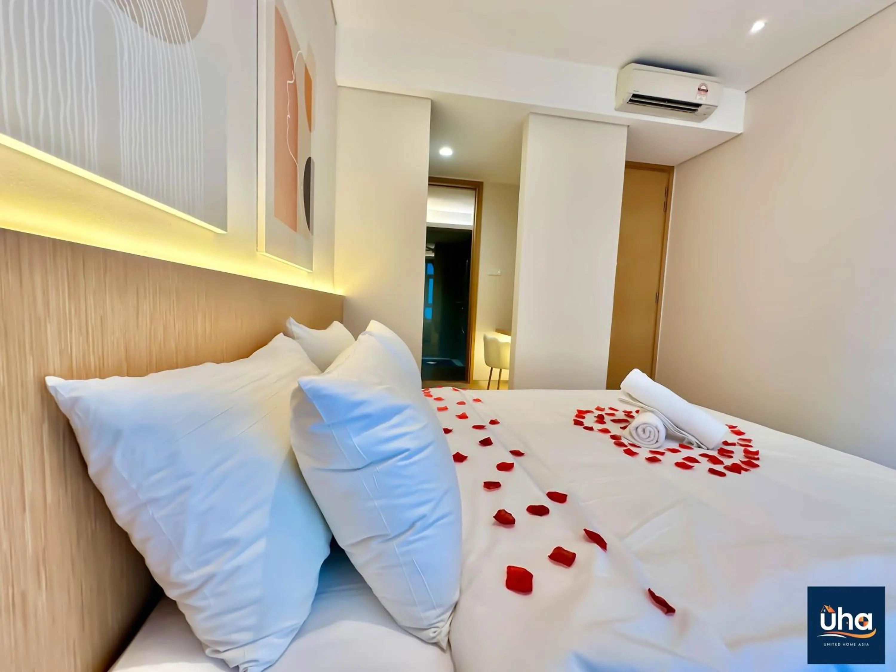 Bed in Pine Tree Suites by RR JBcity