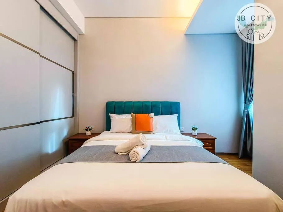 Bed in Pine Tree Suites by RR JBcity